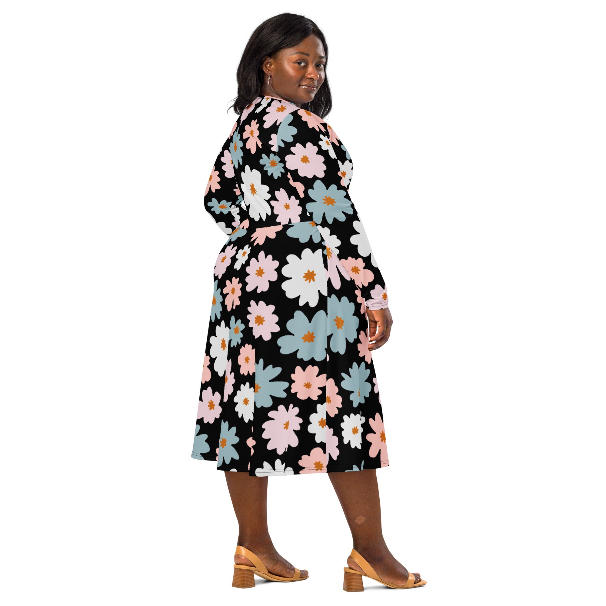 A black wrap dress with vibrant pink white and light blue floral pattern long sleeves midi length with pockets