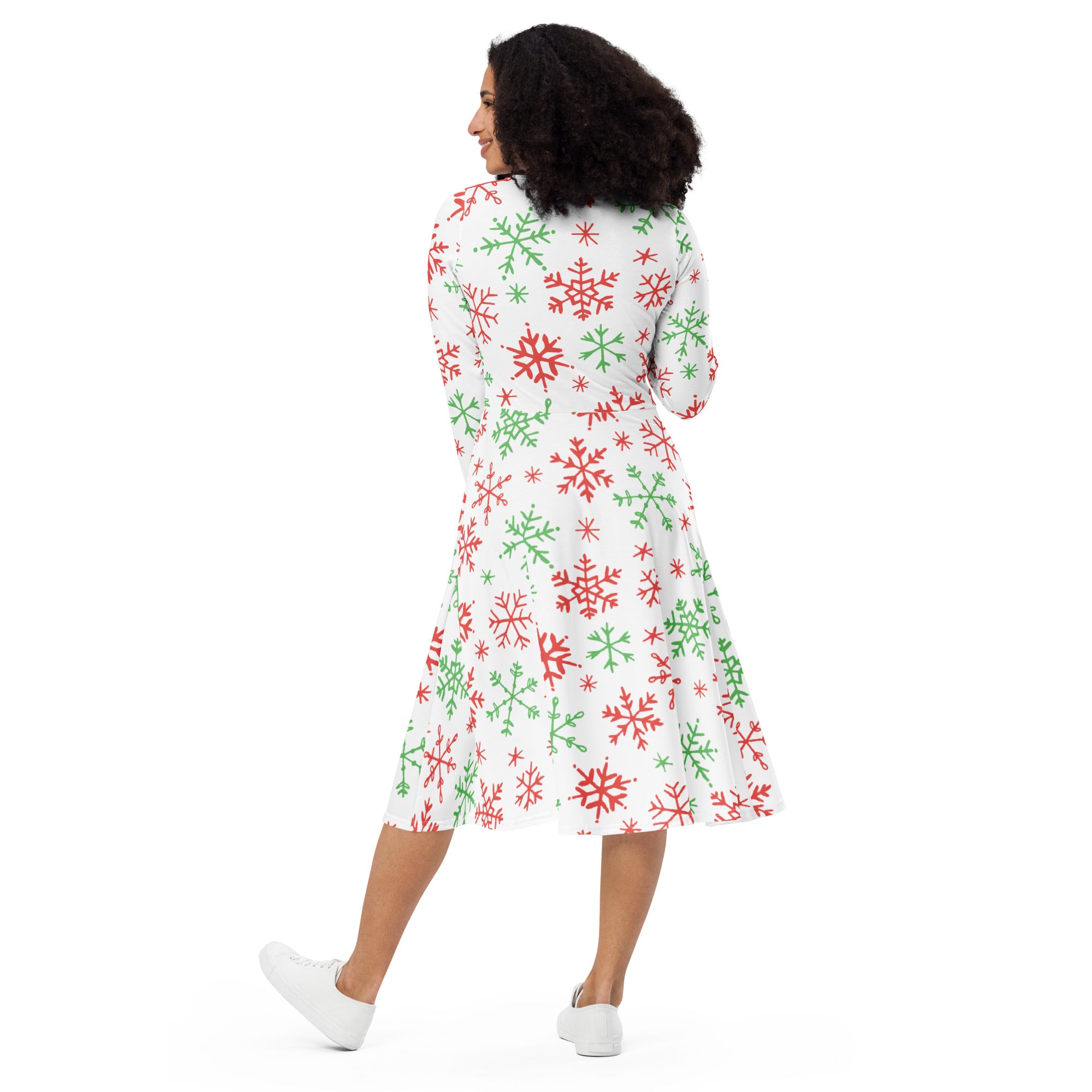 Women’s long sleeve white a-line midi dress with red and green snowflake pattern and pockets for Christmas wear