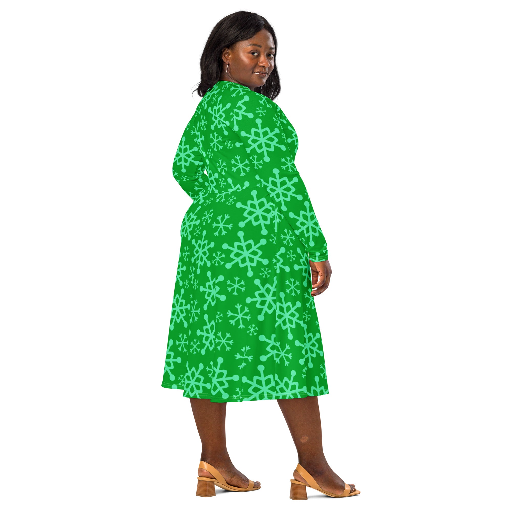 A vibrant green long sleeve midi dress with light mint snowflake pattern and pockets for women