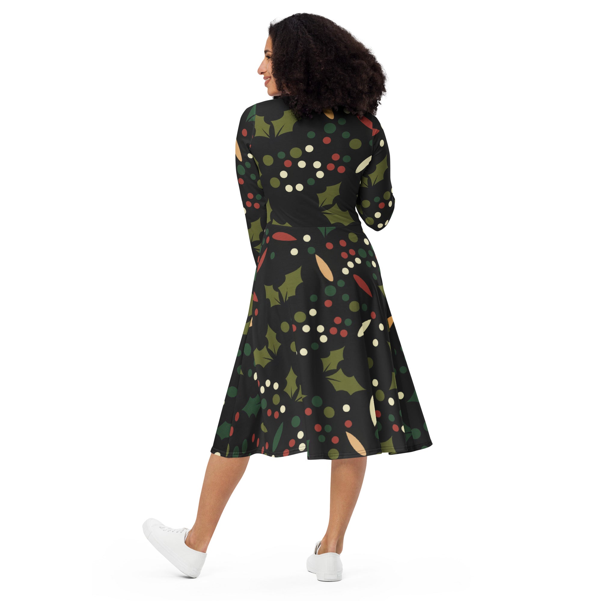 Women’s dark holly berry long sleeve midi dress in black with festive green holly leaves red and white berries and pockets