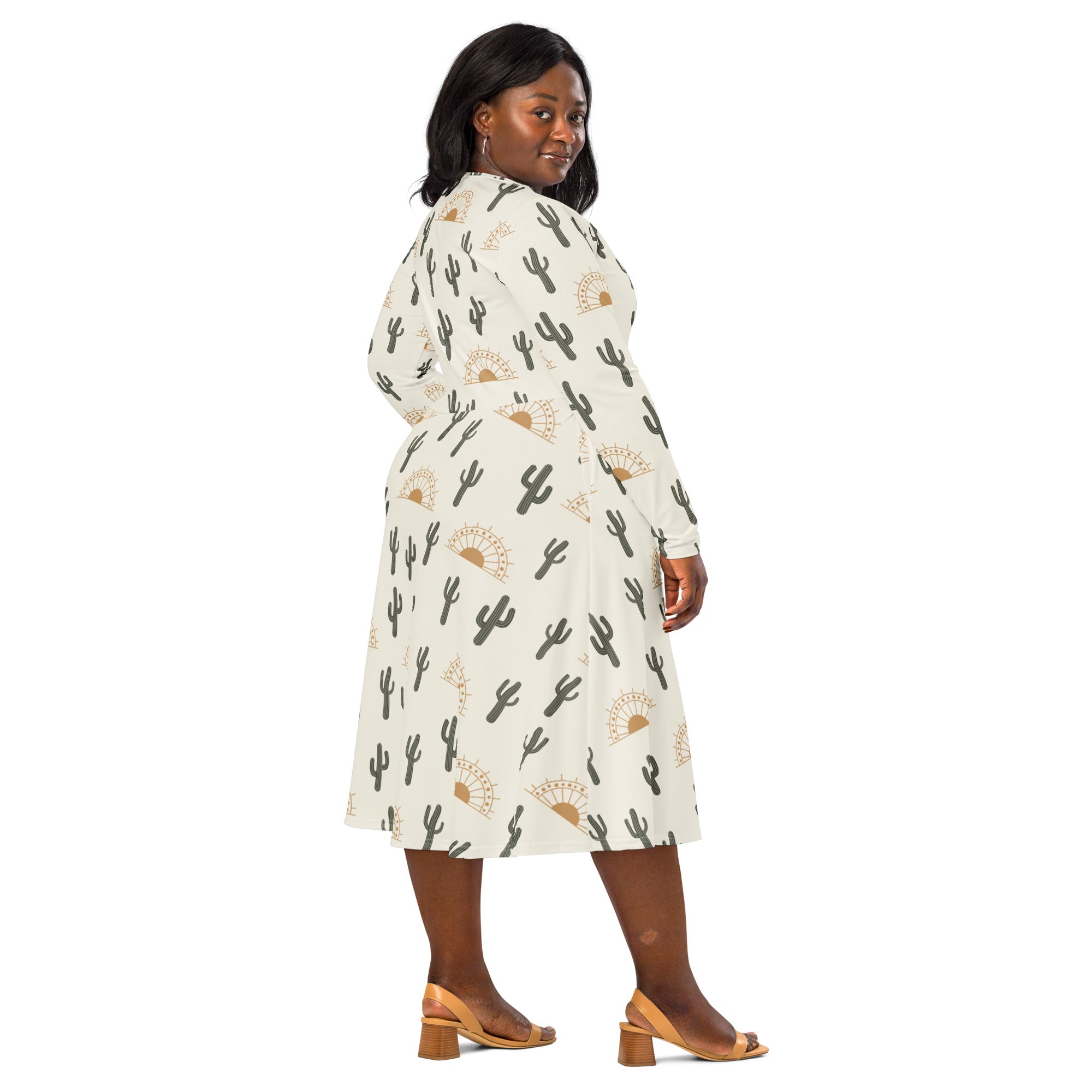 Women’s cactus desert sunrise long sleeve midi dress in off-white fabric with black cacti and gold sunburst motifs