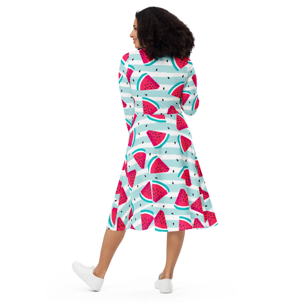 Women’s striped watermelon long sleeve midi dress with pockets featuring bold red, green, and teal pattern on white