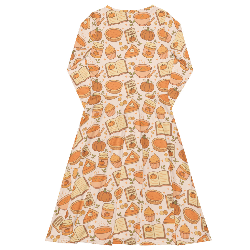 Women’s peach long sleeve midi dress with pockets featuring playful autumn pumpkins pies cupcakes and books pattern