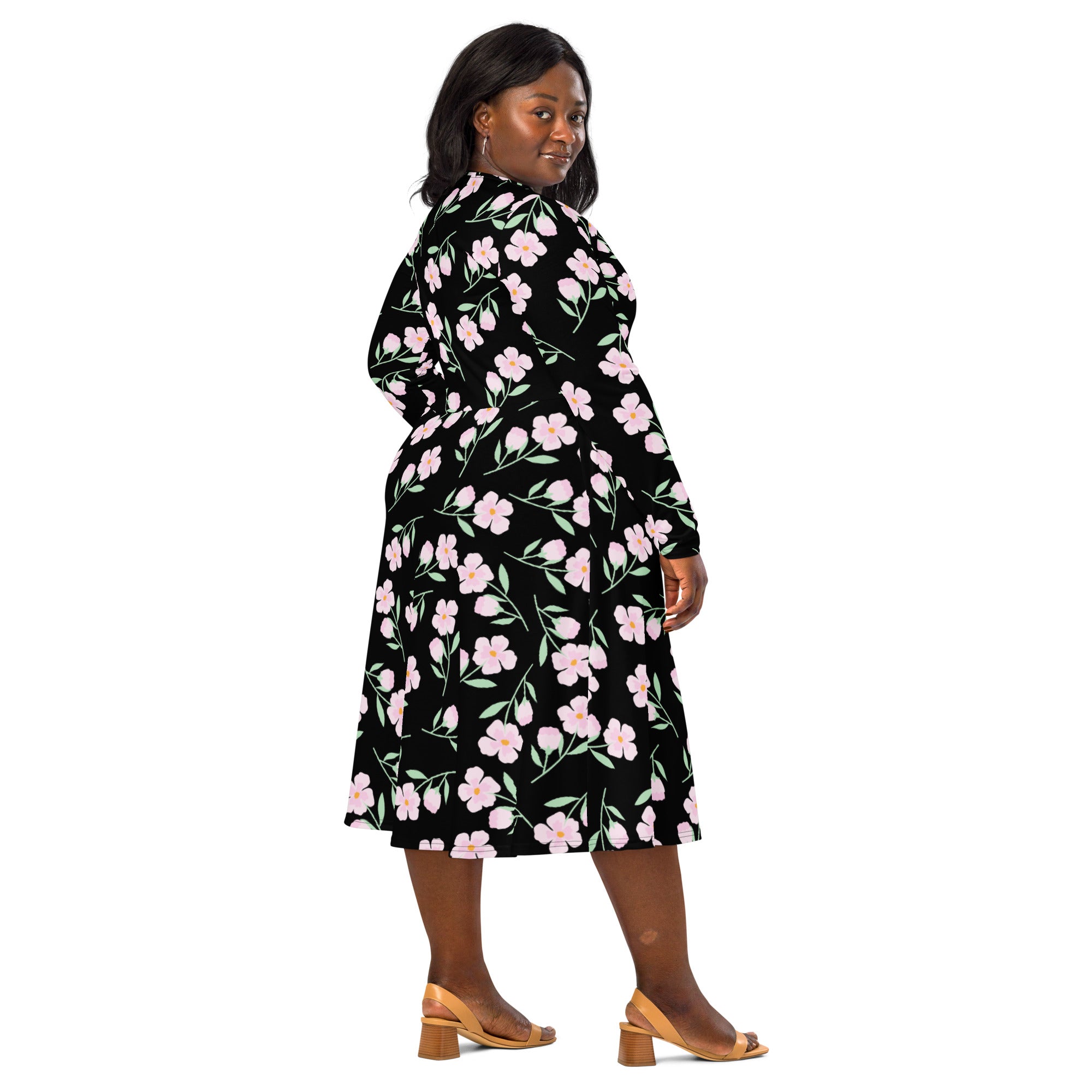 Women’s black floral long sleeve midi wrap dress with pink flowers green stems and a belted waist with pockets