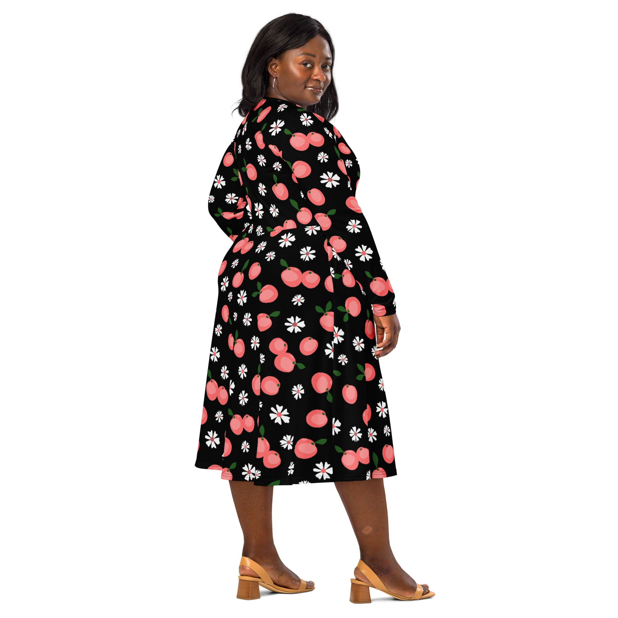 Women’s peach blossom long sleeve midi dress in black with pink cherry and white daisy pattern and pockets
