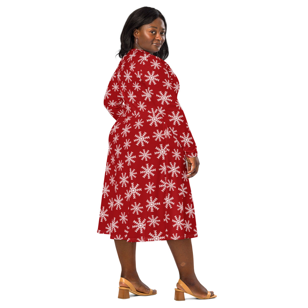 Women’s red winter midi dress with long sleeves and white snowflake pattern featuring pockets
