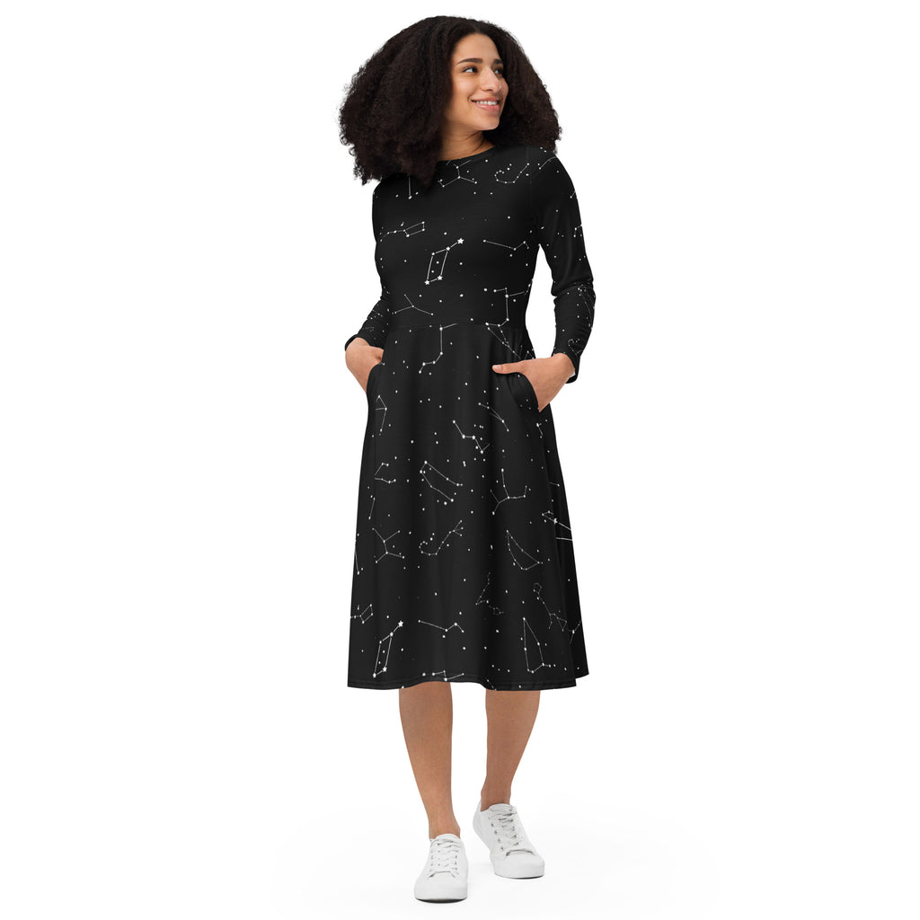 Women’s black midi dress with white constellation print long sleeves and pockets in a realistic design