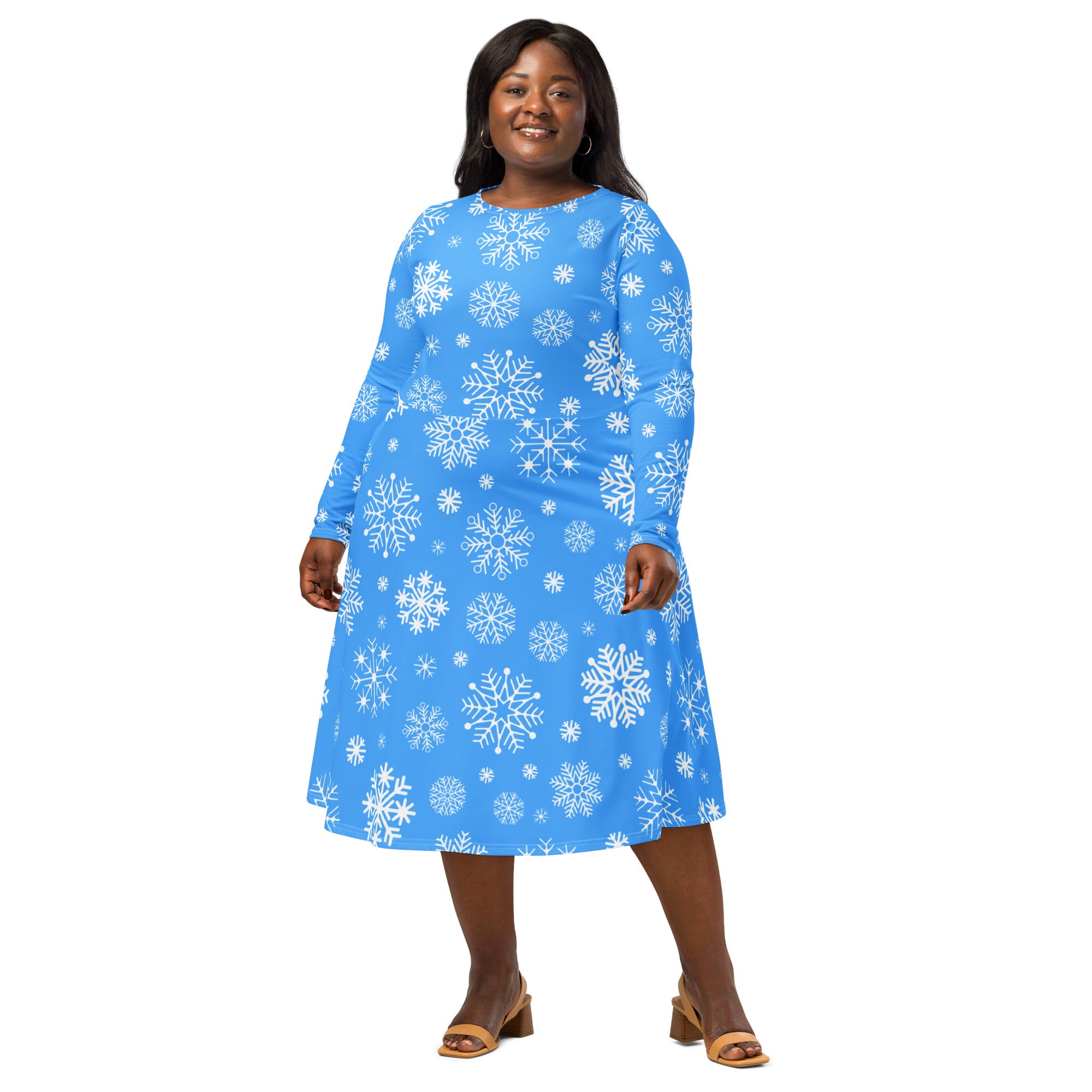 Women’s blue snowflake long sleeve midi dress with pockets featuring a vibrant plus-size flared skirt design