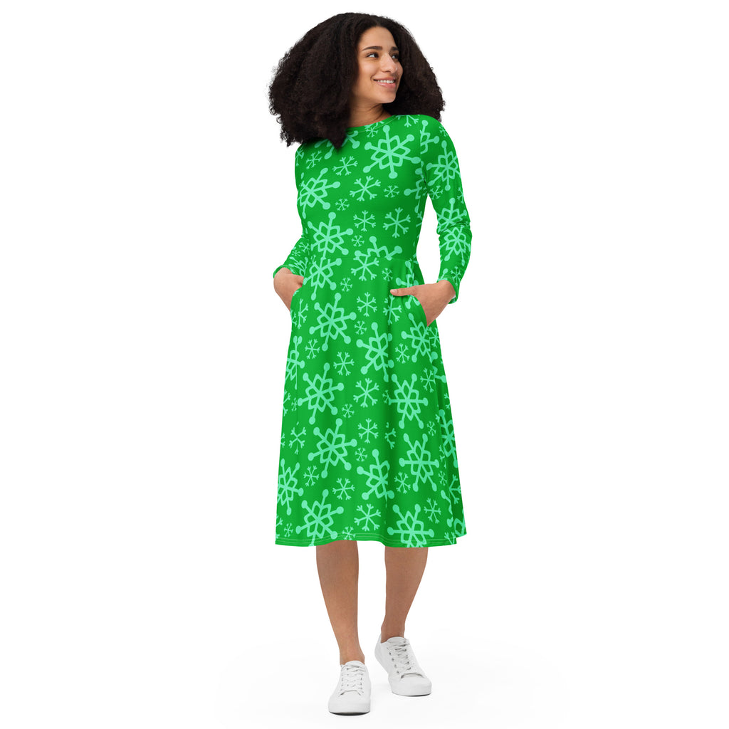A vibrant green midi dress with light mint snowflake pattern long sleeves and two front pockets for women