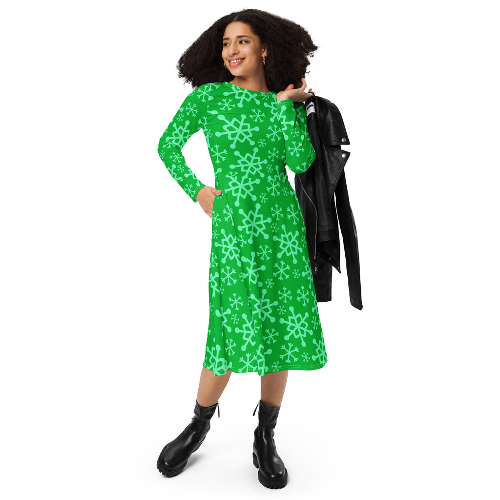Women’s vibrant green midi dress with light teal snowflake pattern long sleeves and pockets