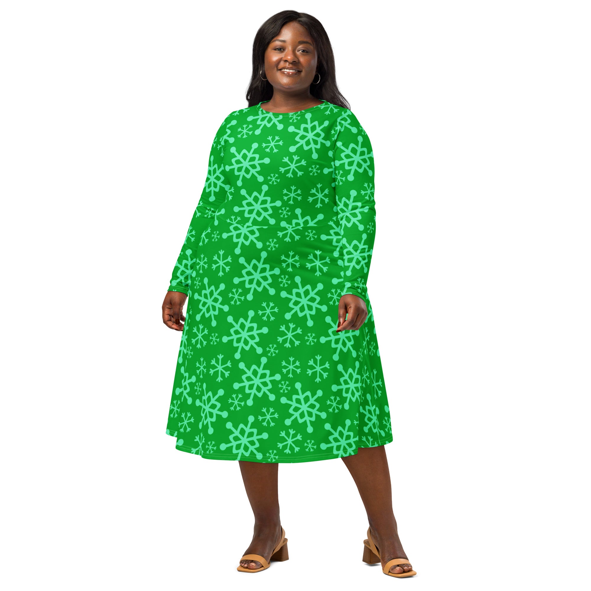 A vibrant green plus-size long sleeve midi dress with light mint snowflake pattern and pockets for women