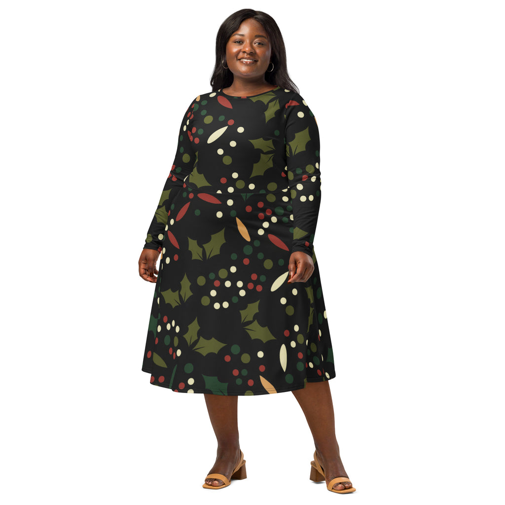 A plus-size woman wears a black long-sleeved a-line midi dress with holly berry print and pockets