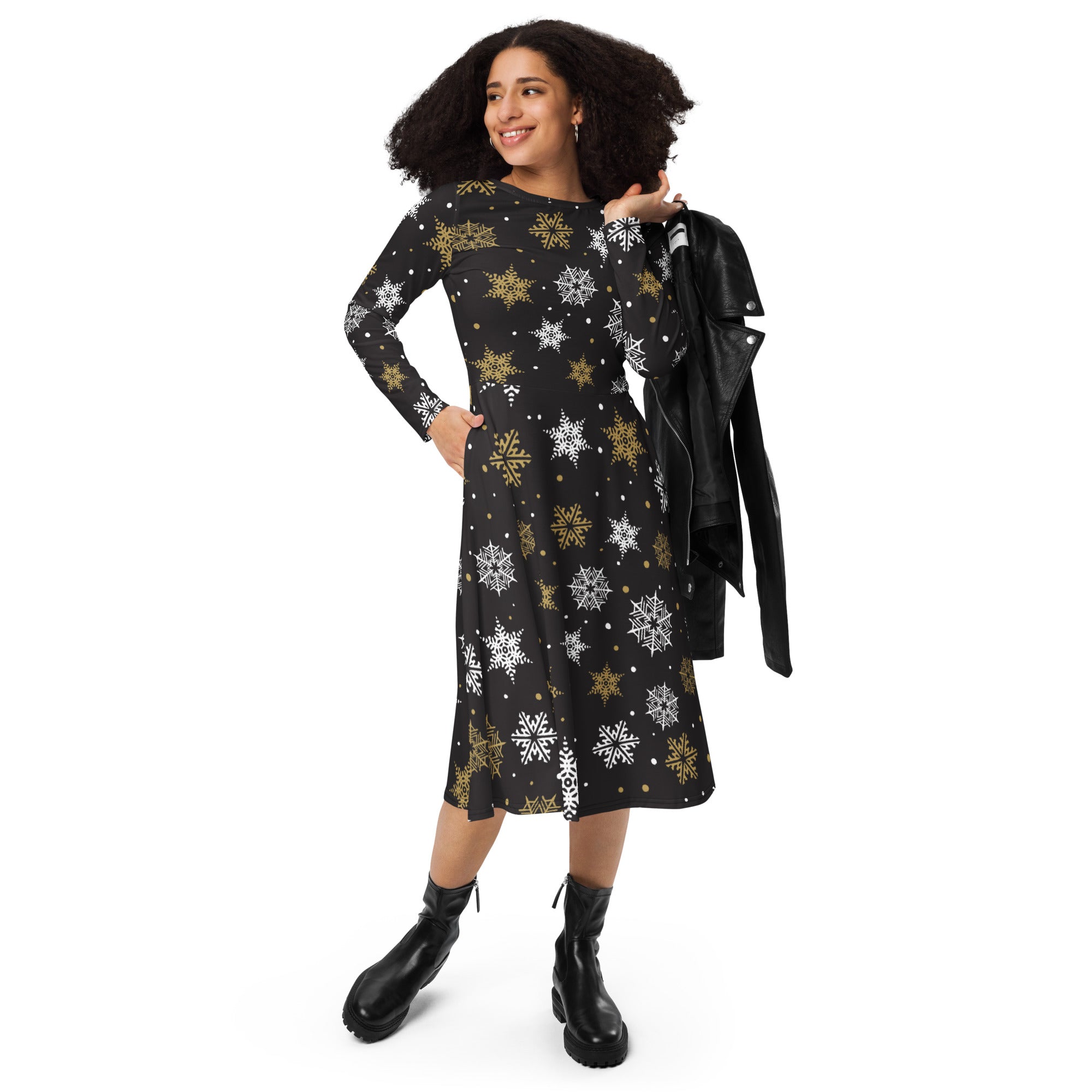 Black long sleeve midi dress with gold and white snowflake pattern and pockets perfect for festive occasions