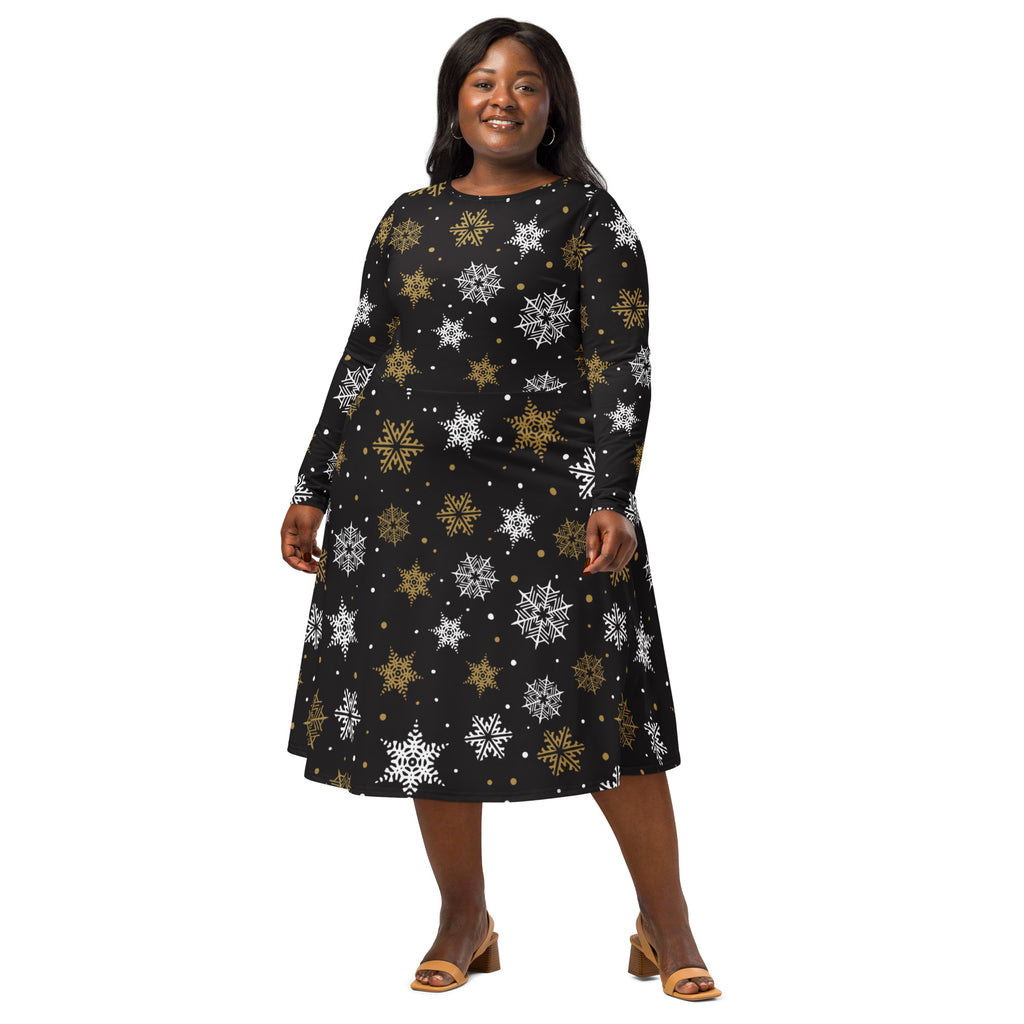 Women’s black plus-size long sleeve midi dress with white and gold snowflake pattern and pockets for festive wear