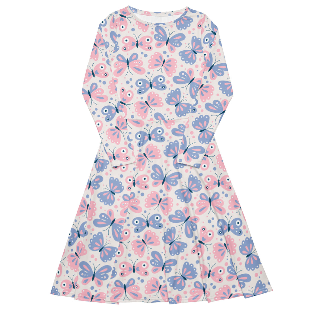 A girls long-sleeved midi dress with playful pink and blue butterfly pattern on white fabric with pockets