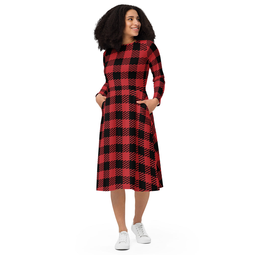 A woman wears a women’s red buffalo plaid long sleeve midi dress with fitted waist and side pockets