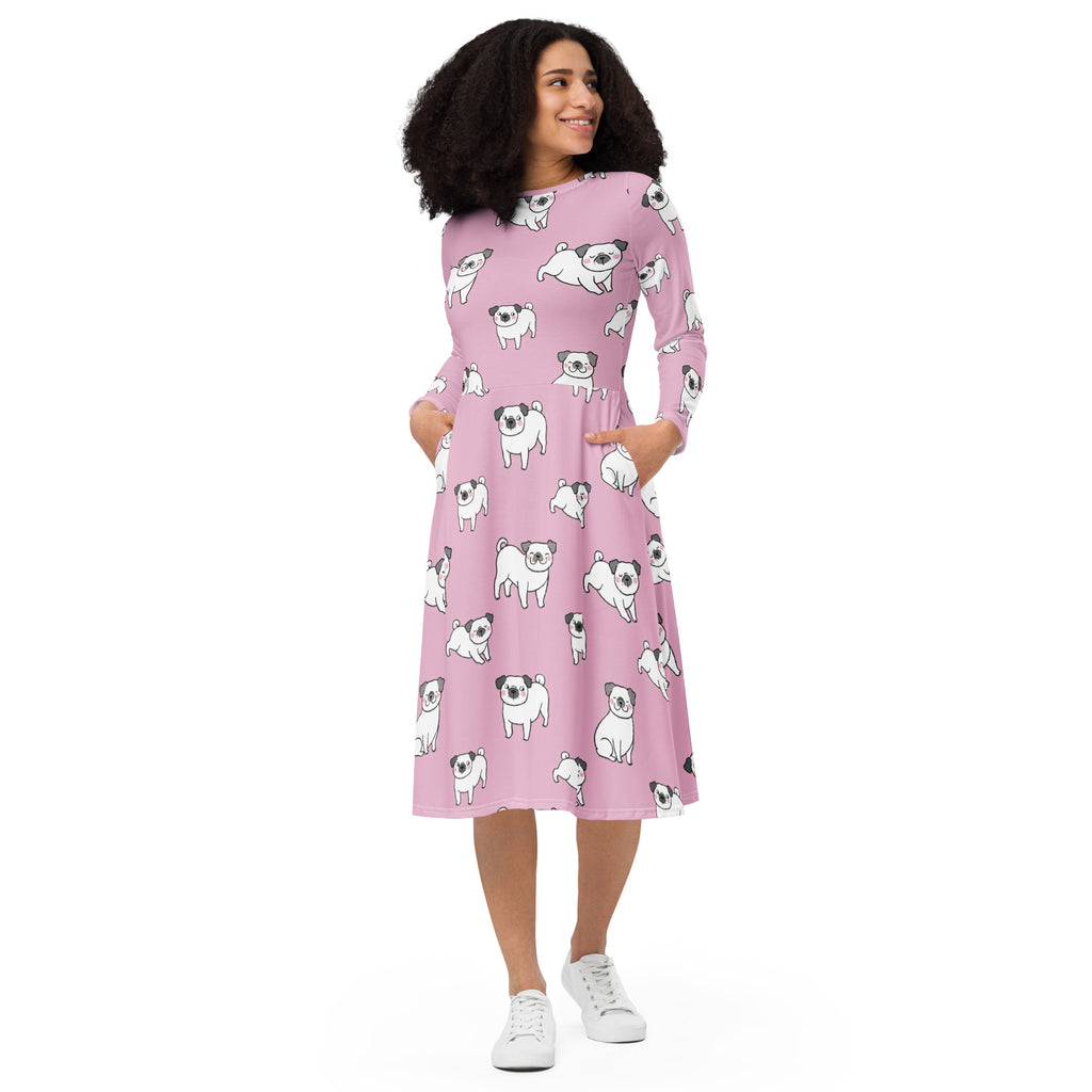 Women’s pink long sleeve midi dress with pockets featuring a playful pattern of cartoon pugs in various poses