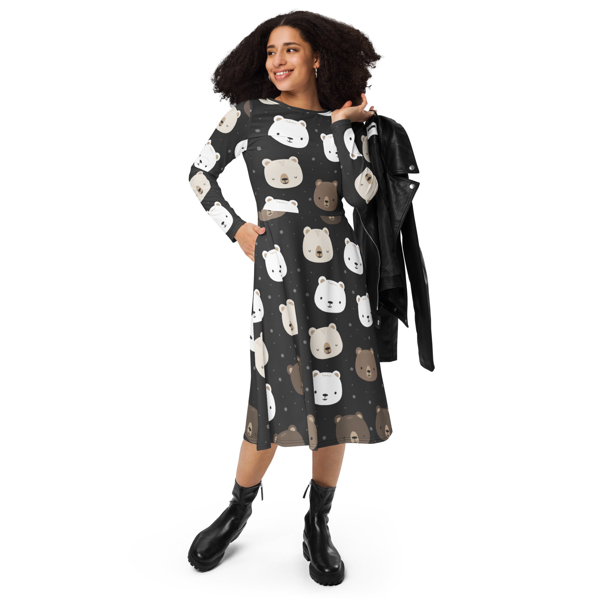 Women’s black midi dress with long sleeves and pockets featuring a playful white and brown bear face pattern