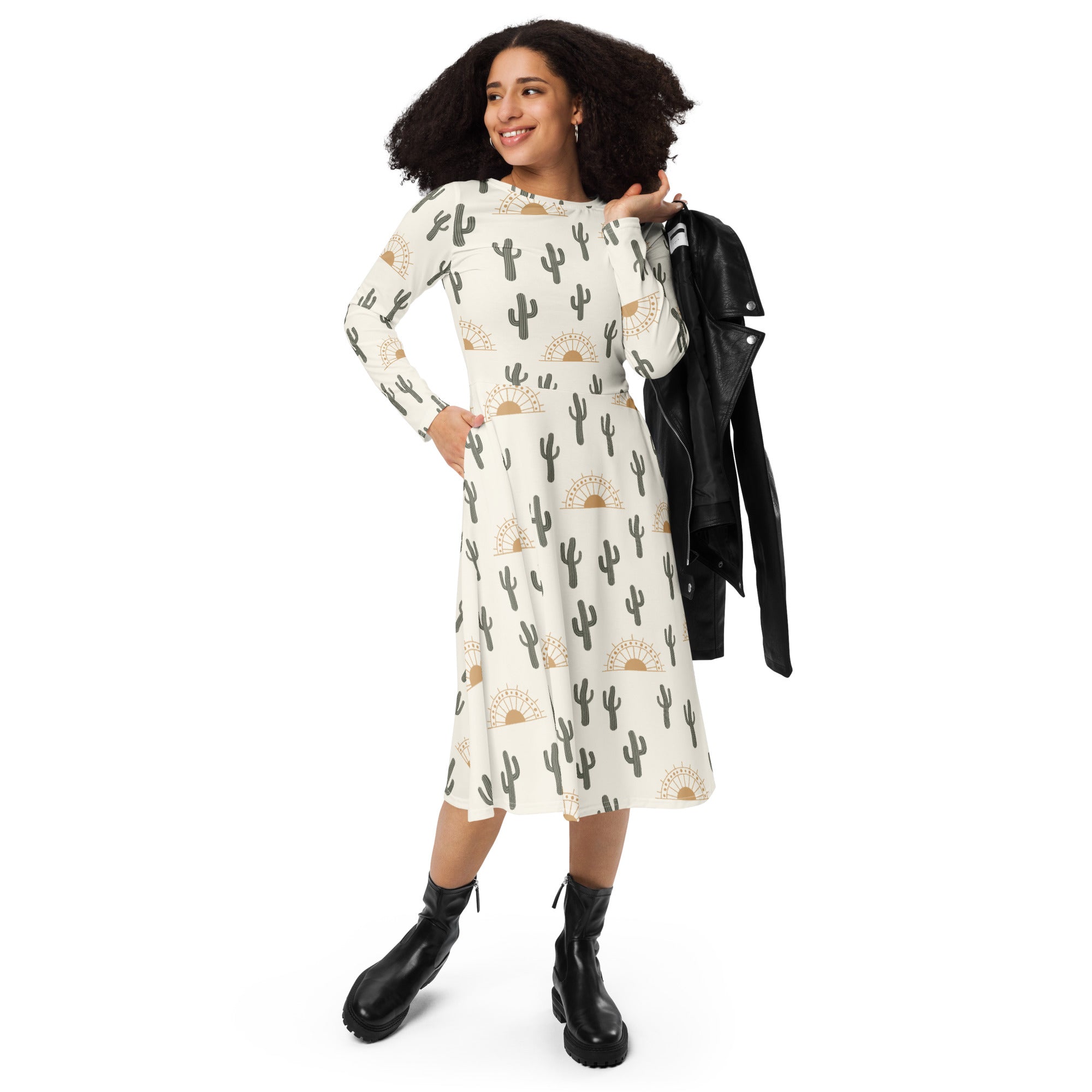 Women’s off-white long sleeve midi dress with black cactus and gold sun pattern and pockets in lightweight fabric