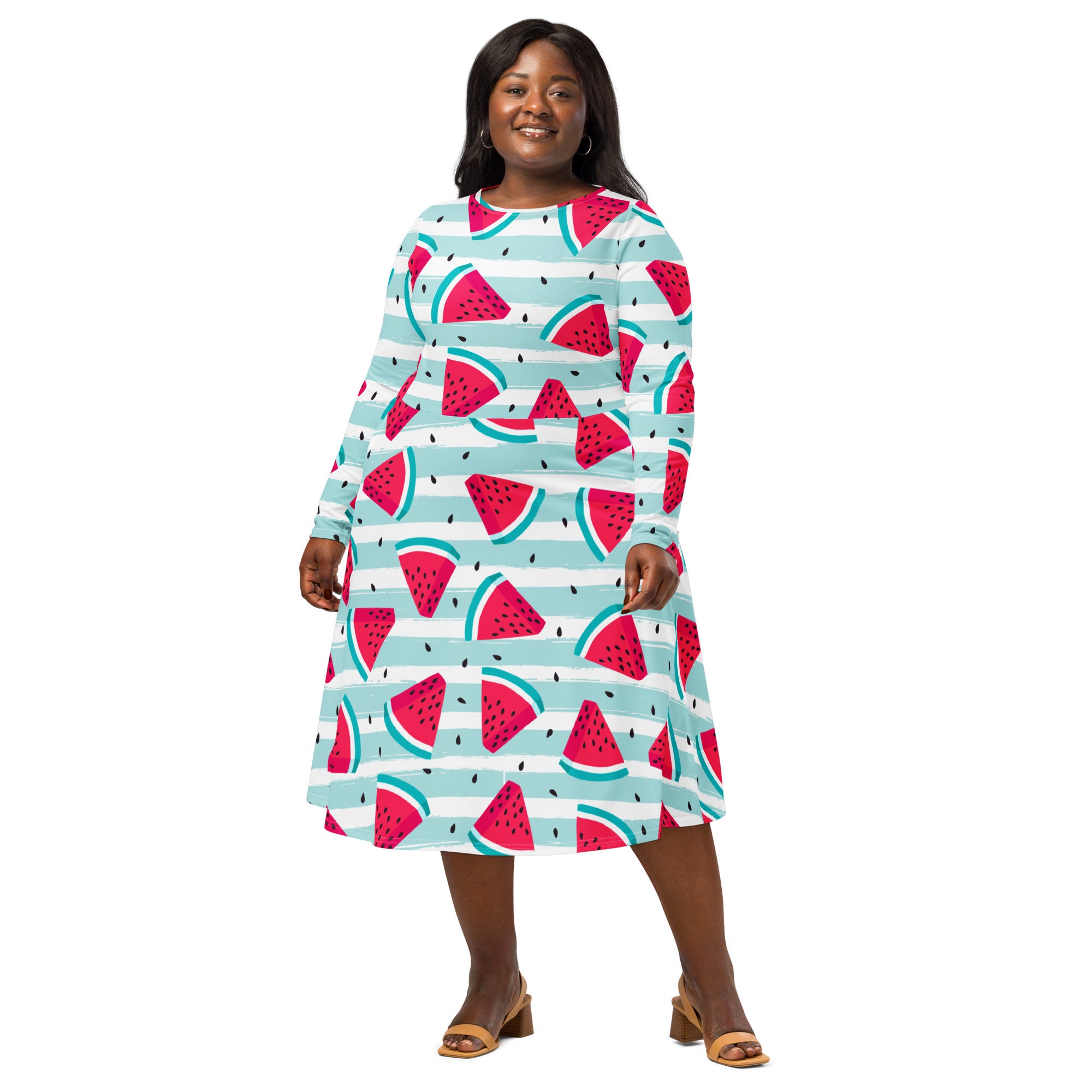 A plus-size woman wears a women’s striped watermelon long sleeve midi dress with pockets in light blue and white