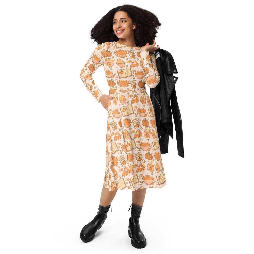 Women’s pumpkin pie themed long sleeve midi dress in soft peach with autumn illustrations and pockets