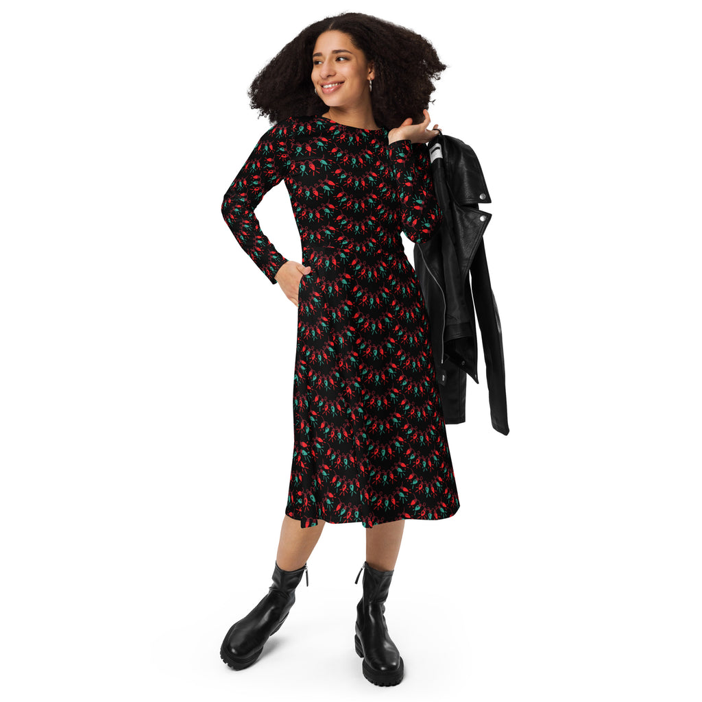 Black midi dress with long sleeves and pockets featuring a vibrant red and green chili pepper pattern for women