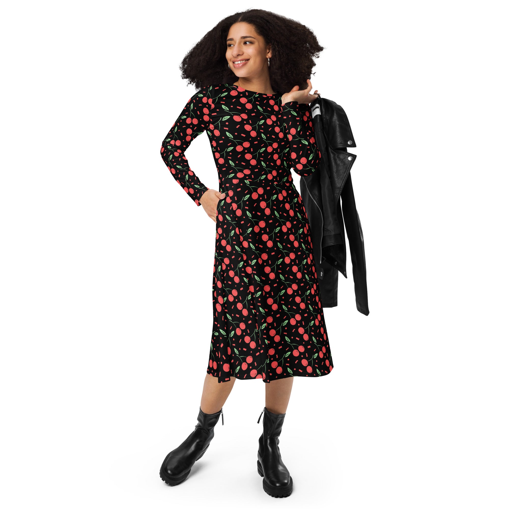 Black midi dress with playful red cherry and green leaf pattern long sleeves fitted waist and pockets vintage style