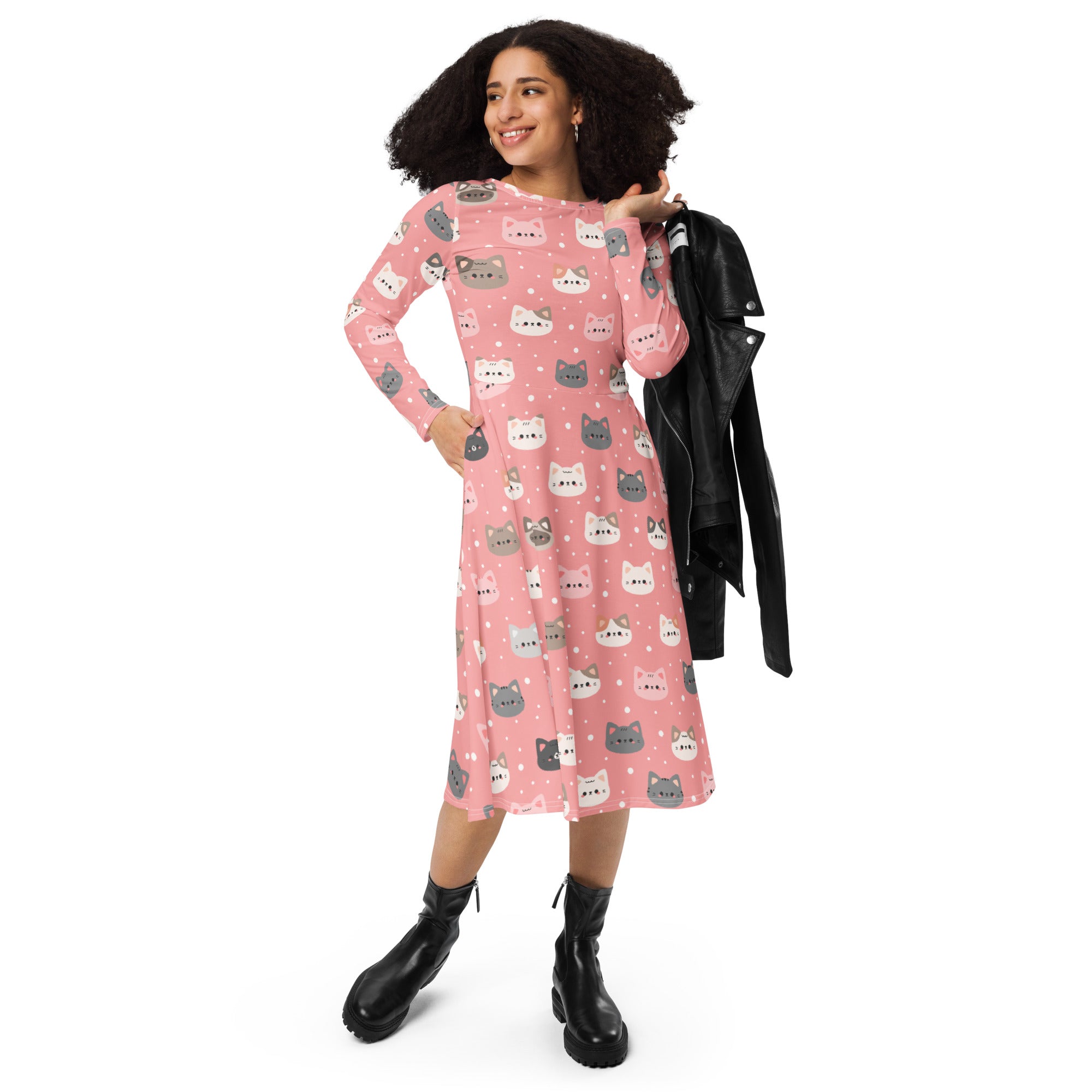 Women’s cute pink long sleeve midi dress with pockets featuring playful gray and white cartoon cat faces pattern