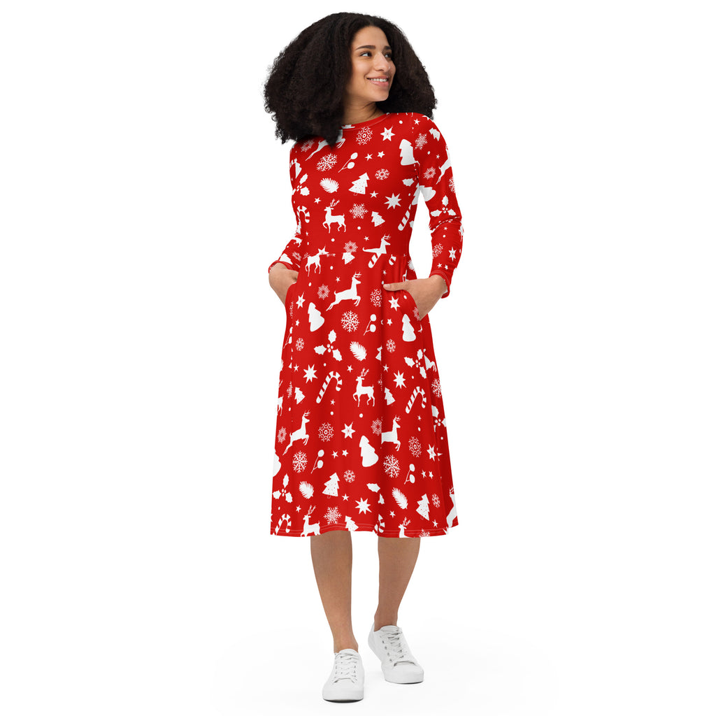Women’s red long sleeve midi dress with festive white holiday motifs and pockets perfect for Christmas gatherings