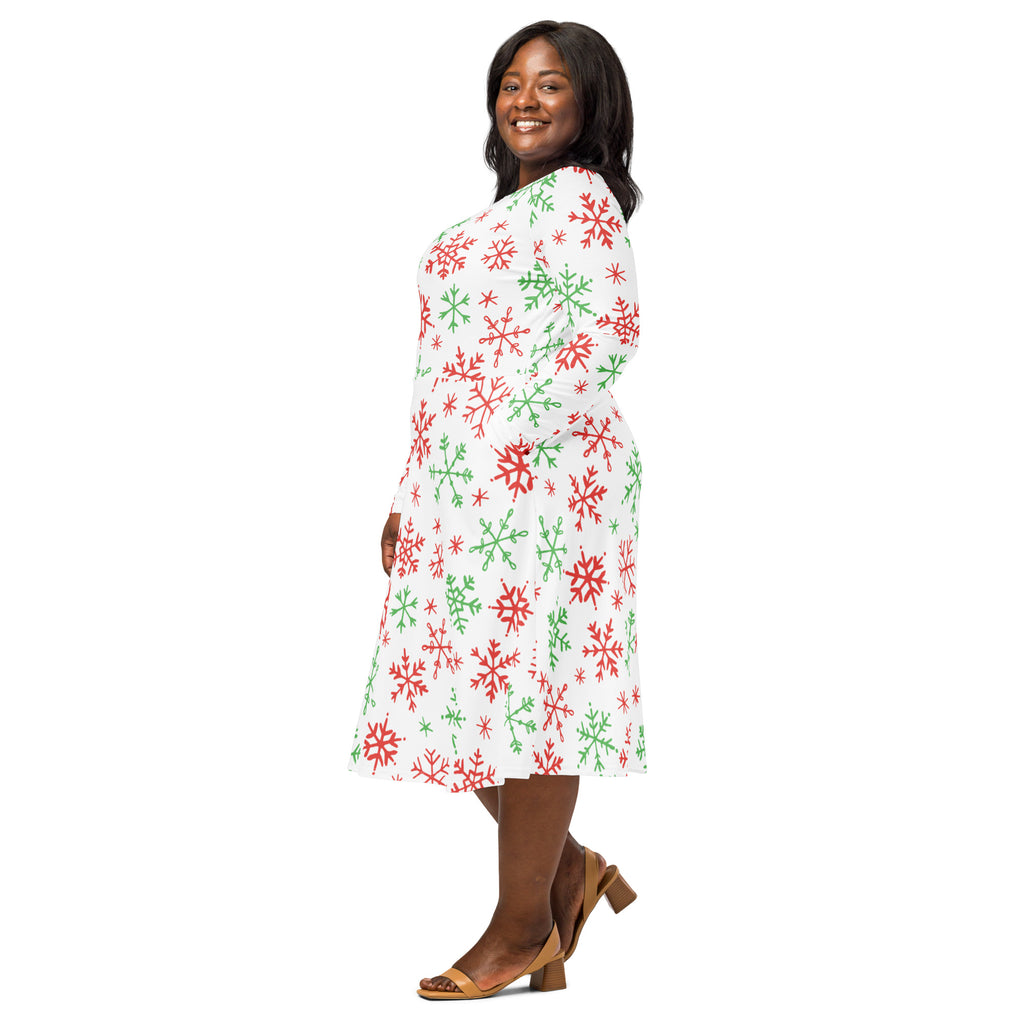 A festive white midi dress with red and green snowflake pattern and long sleeves designed for women with pockets