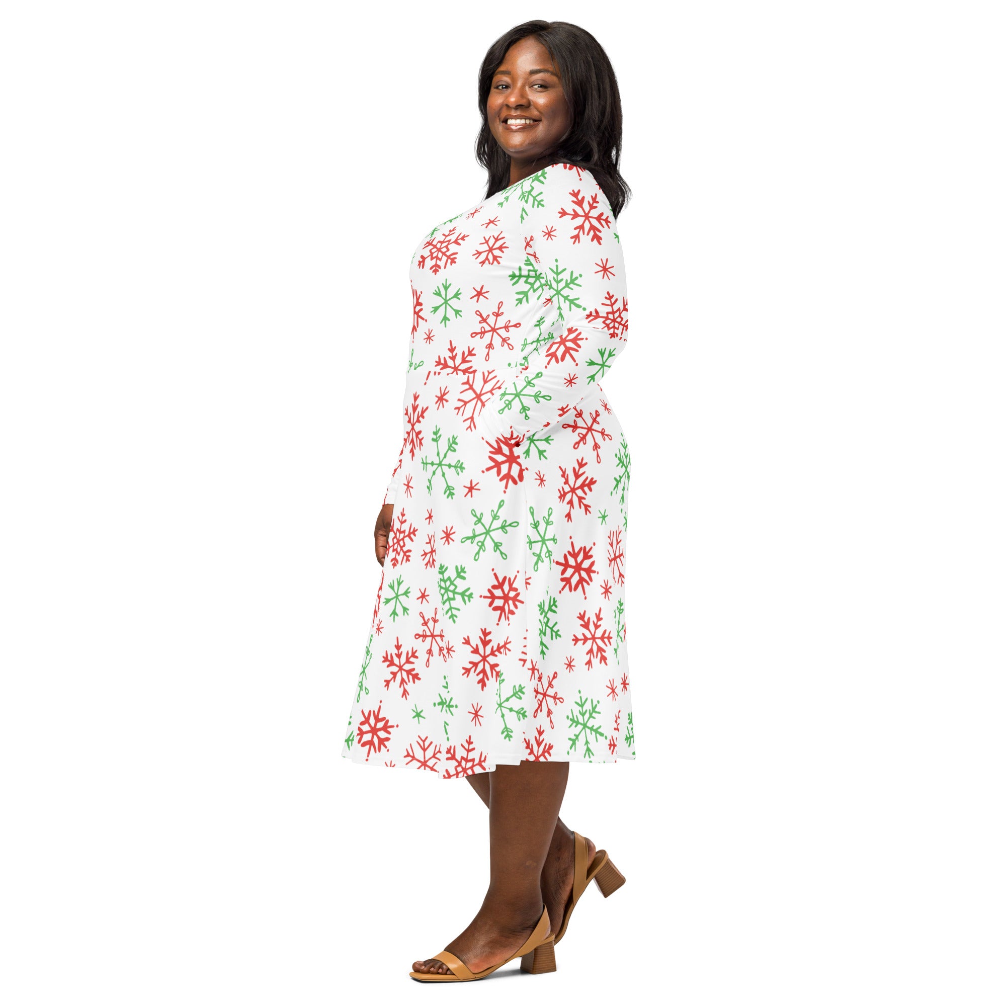 A festive white midi dress with red and green snowflake pattern and long sleeves designed for women with pockets