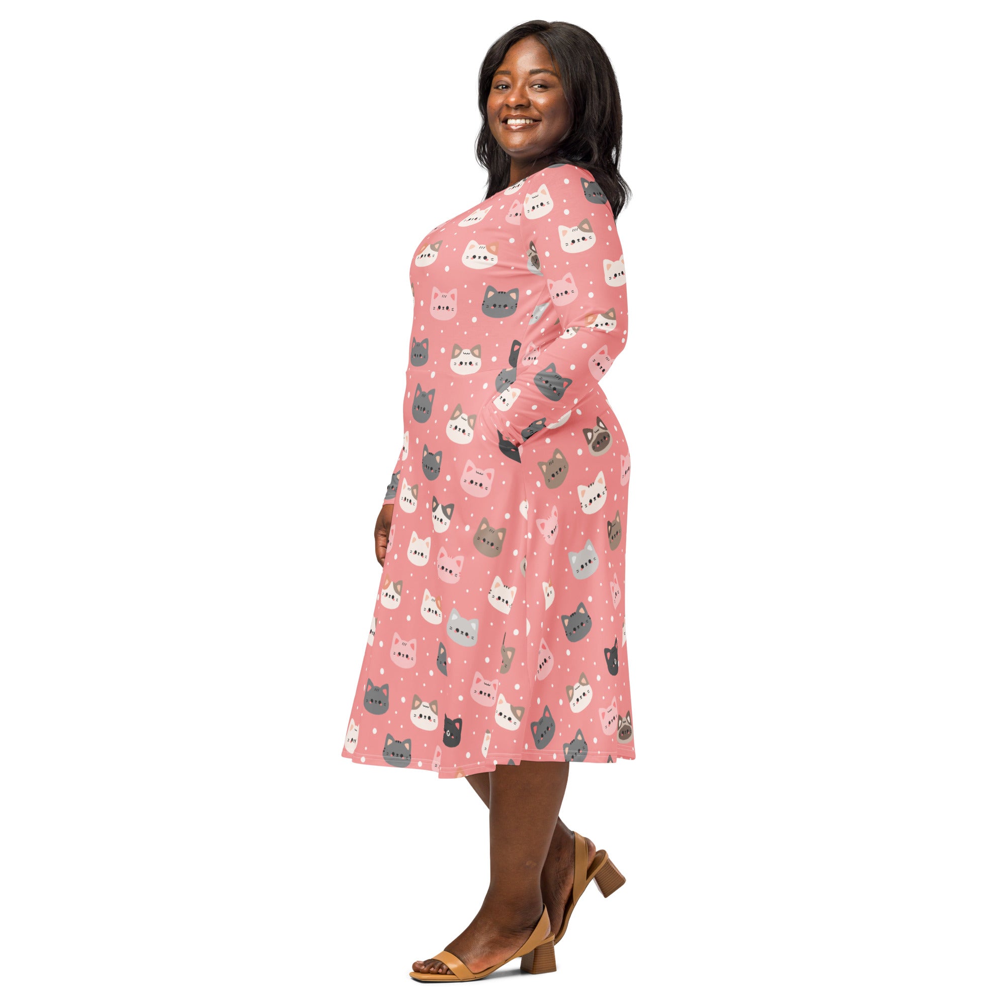 Women’s cute pink long sleeve midi dress with colorful cartoon cat faces, white polka dots, and pockets