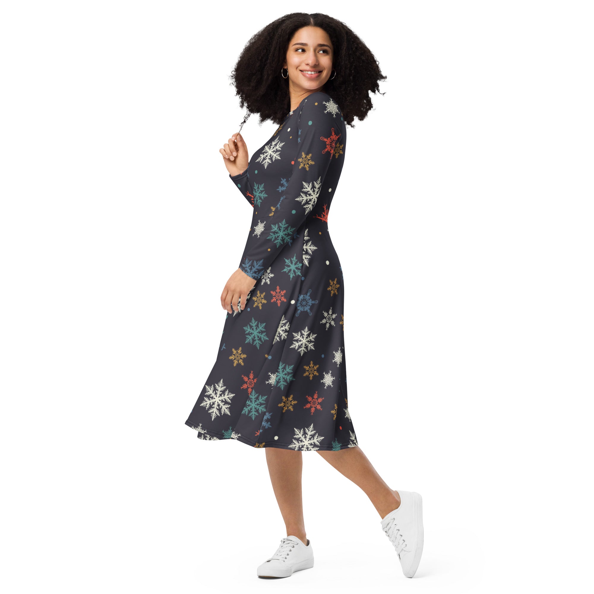 A dark gray wrap dress with multicolored snowflake pattern long sleeves midi length and pockets for women
