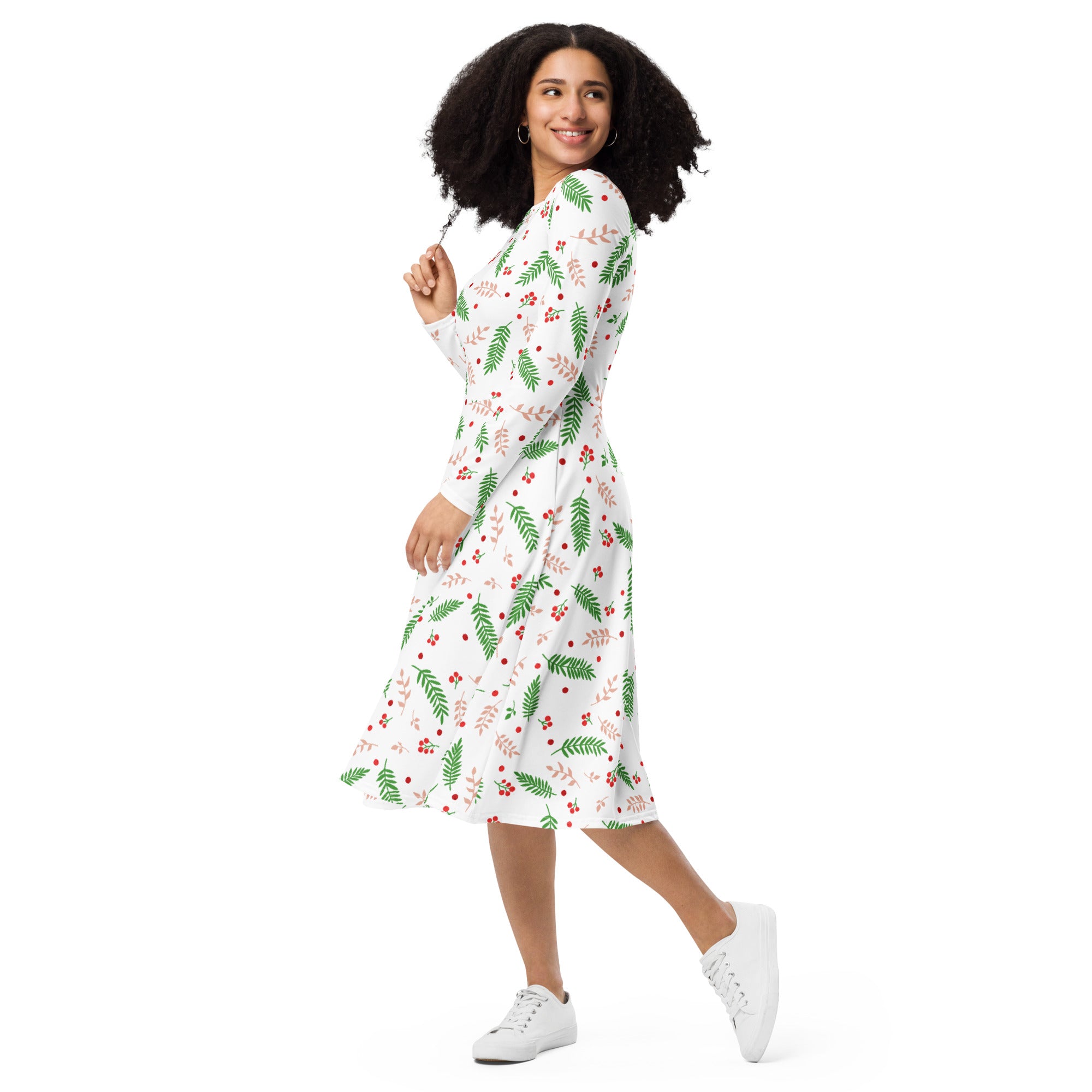 White midi dress with long sleeves and pockets featuring green fern and red berry holly pattern for christmas wear