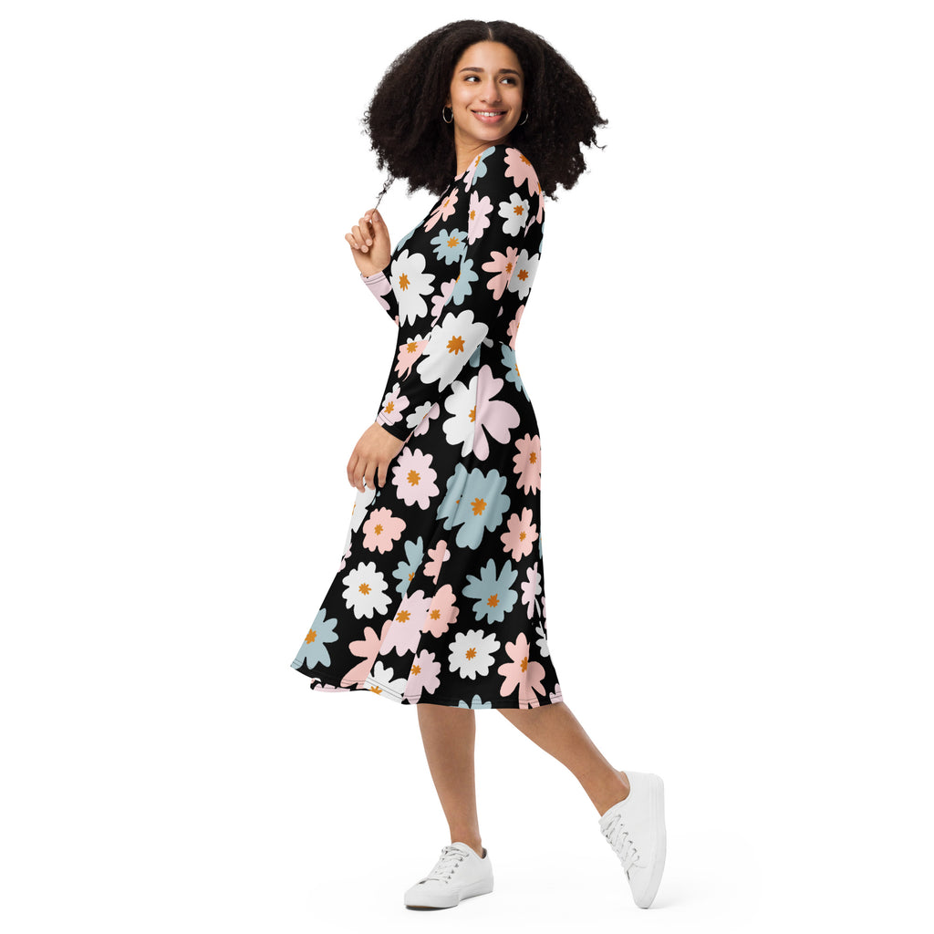 Women’s retro floral long sleeve midi dress in black with vibrant white pink and light blue daisy pattern and pockets