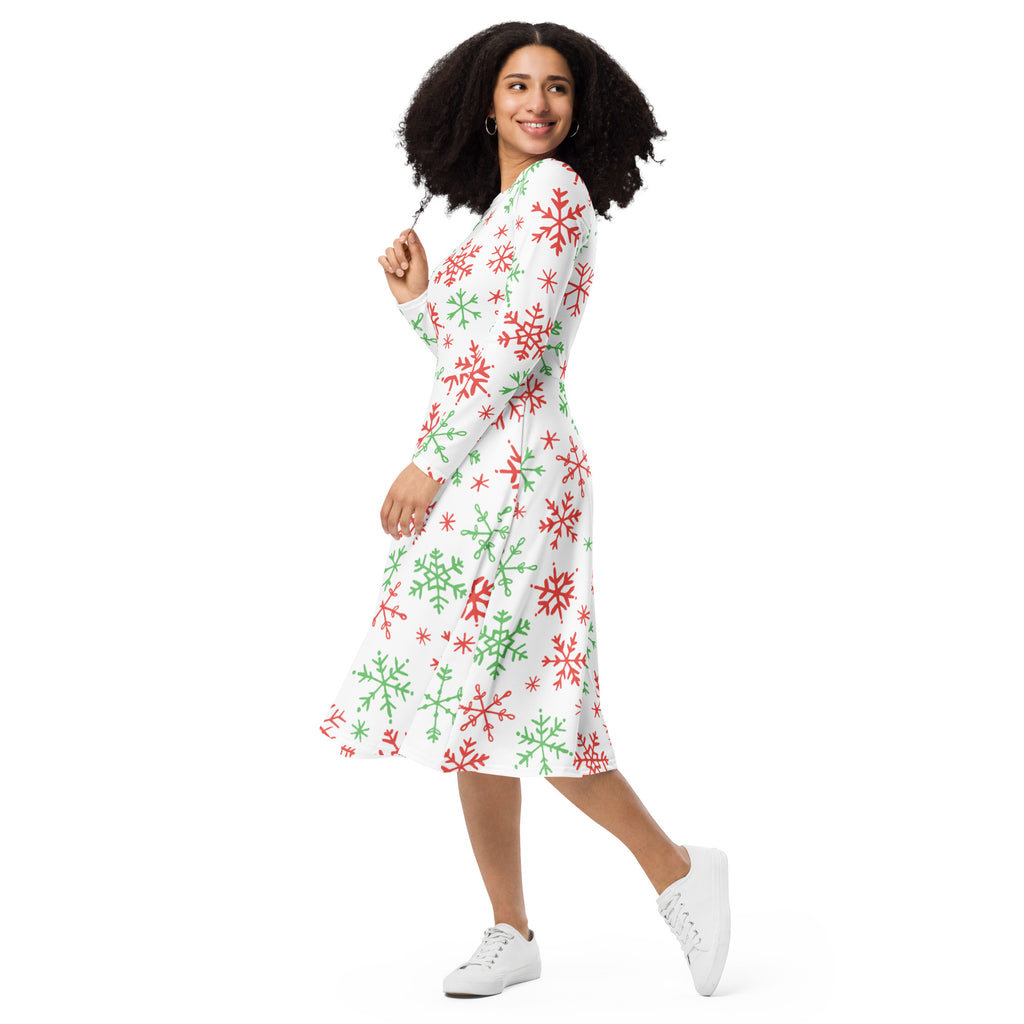 A festive white midi dress with red green snowflakes long sleeves wrap design and pockets perfect for Christmas