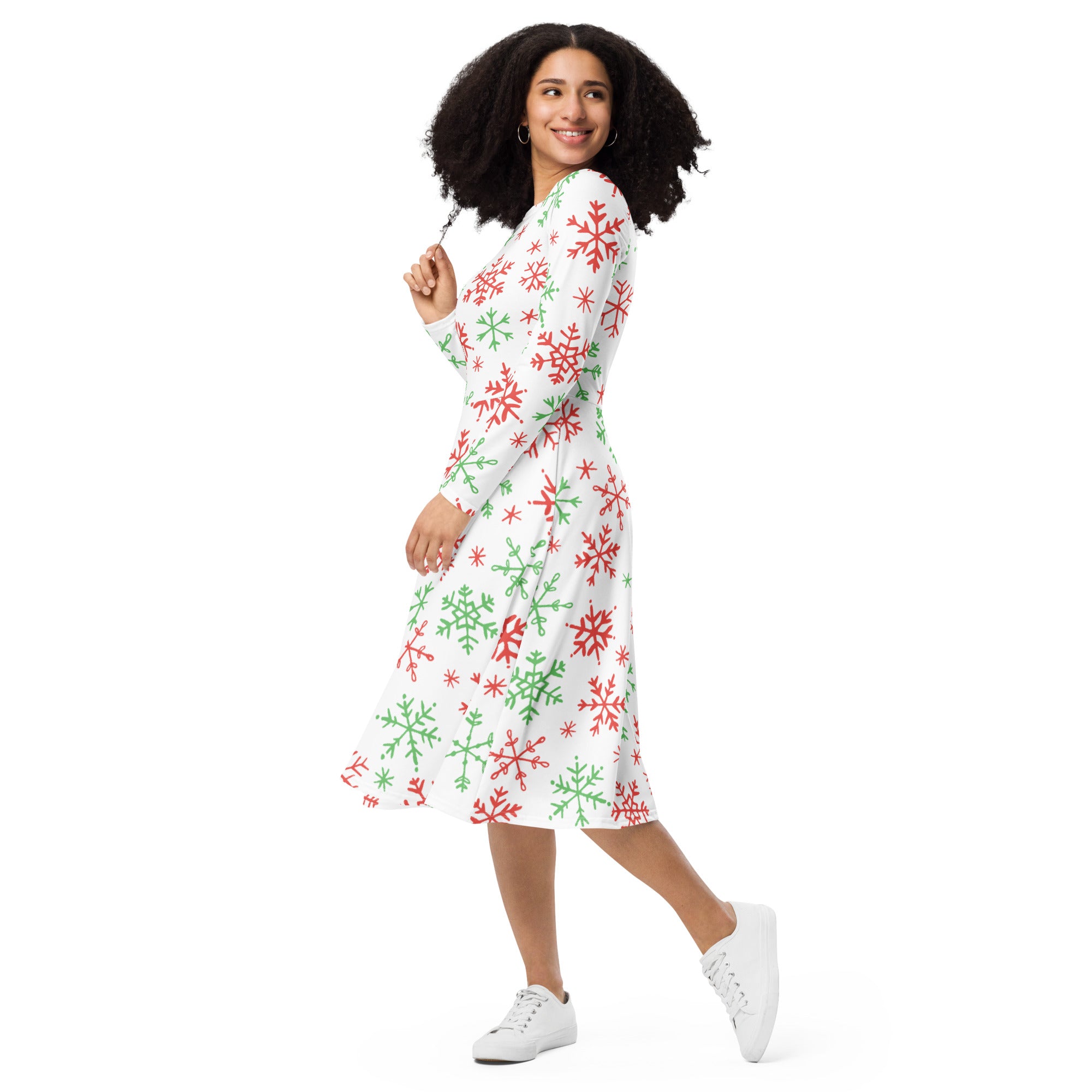 A festive white midi dress with red green snowflakes long sleeves wrap design and pockets perfect for Christmas