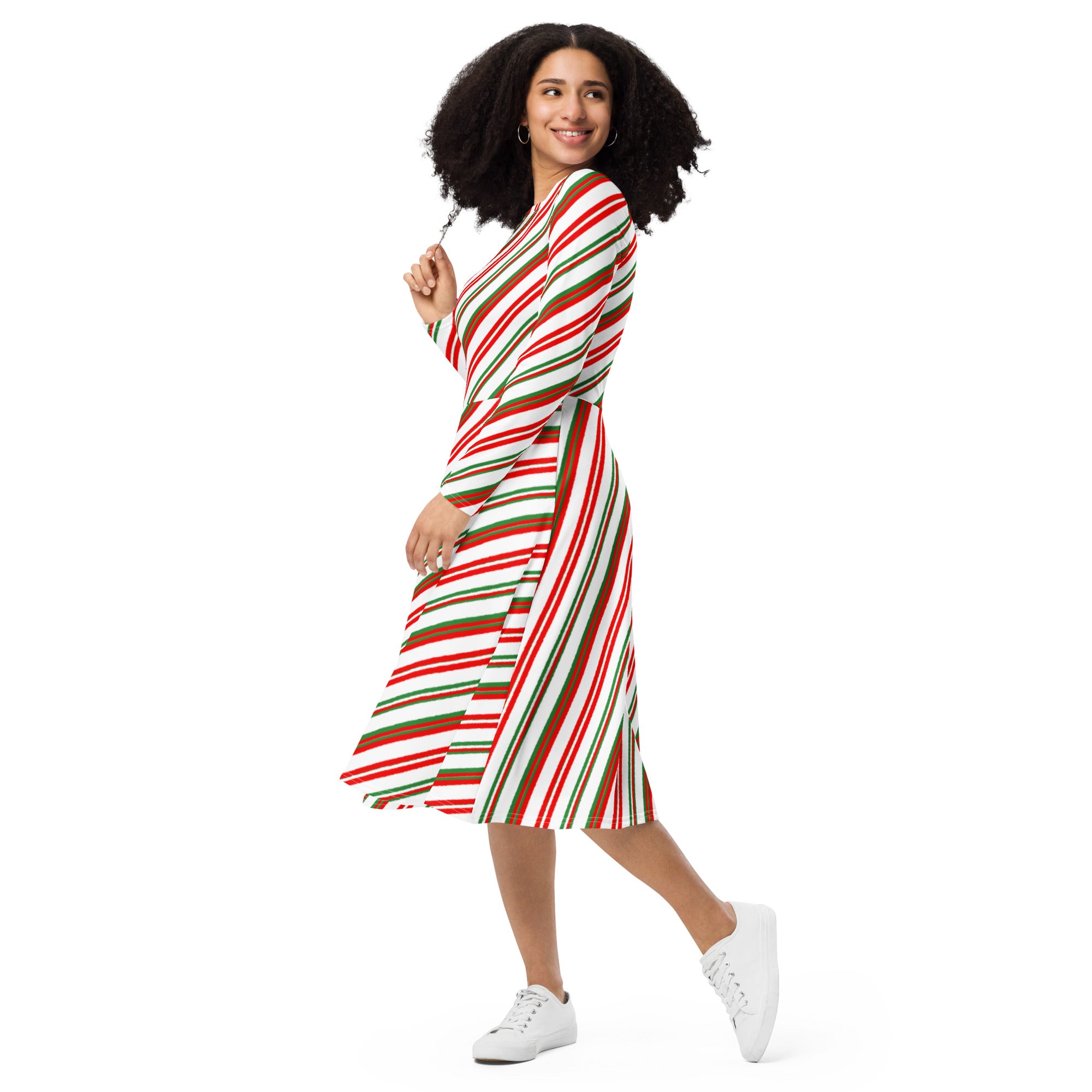 Women’s candy cane stripe long sleeve midi dress with pockets featuring festive red green and white diagonal stripes