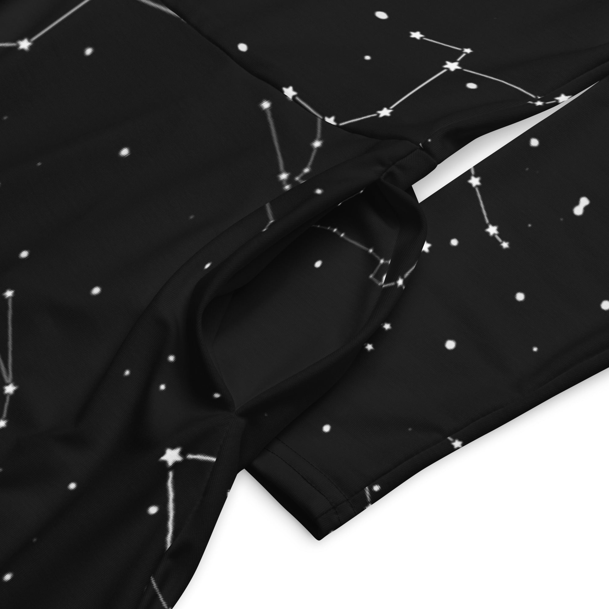 Black short-sleeved top with white constellation print featuring connected stars and scattered dots for women