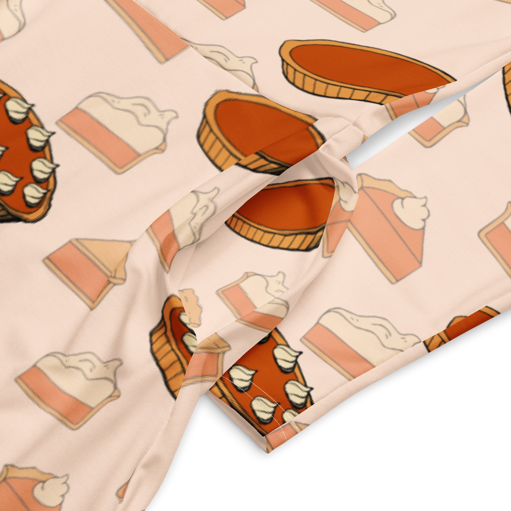 Women’s pumpkin pie thanksgiving long sleeve midi dress in soft peach fabric with illustrated pumpkin pie pattern and pockets