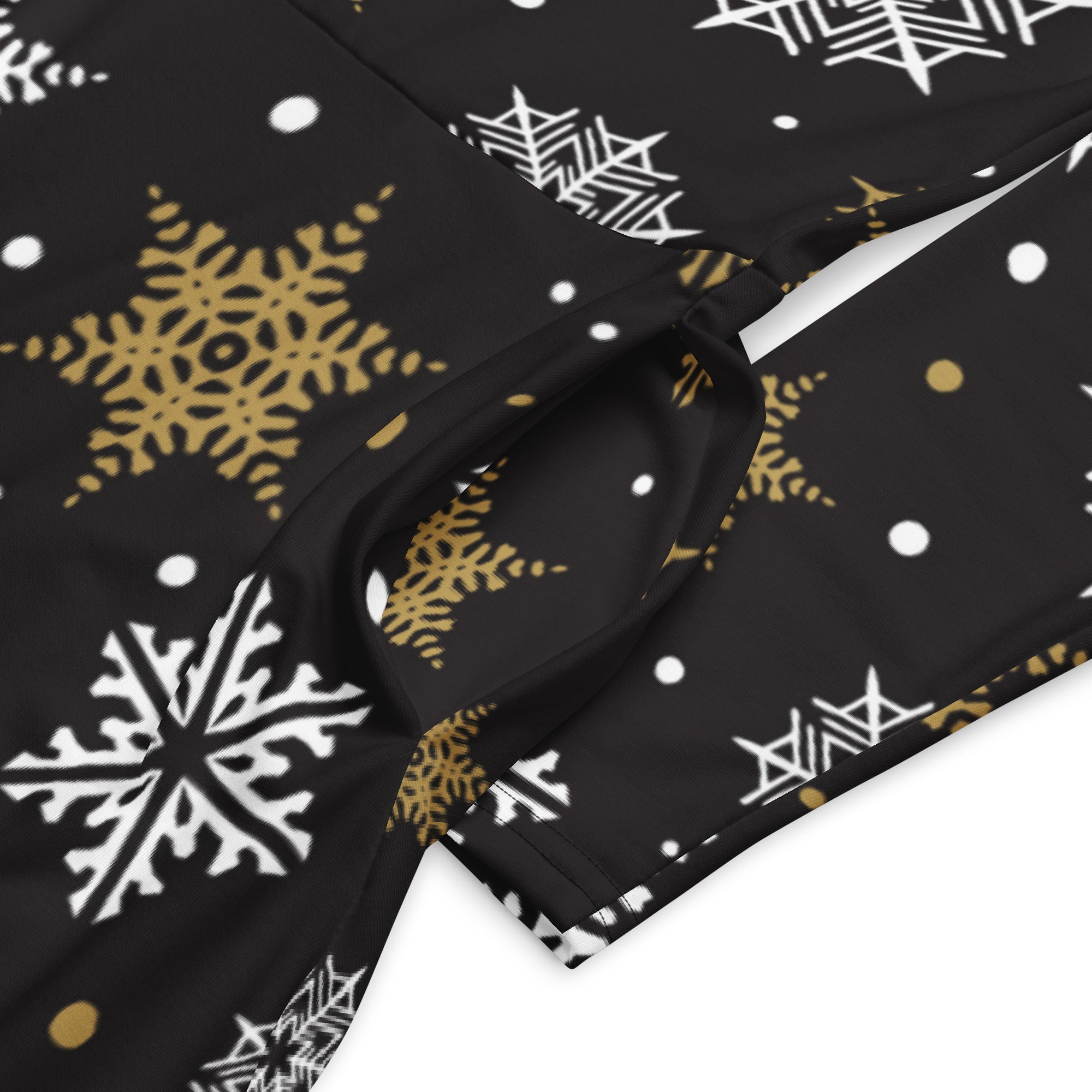 Women’s black fabric gold snowflake long sleeve midi dress with pockets featuring white and gold festive pattern