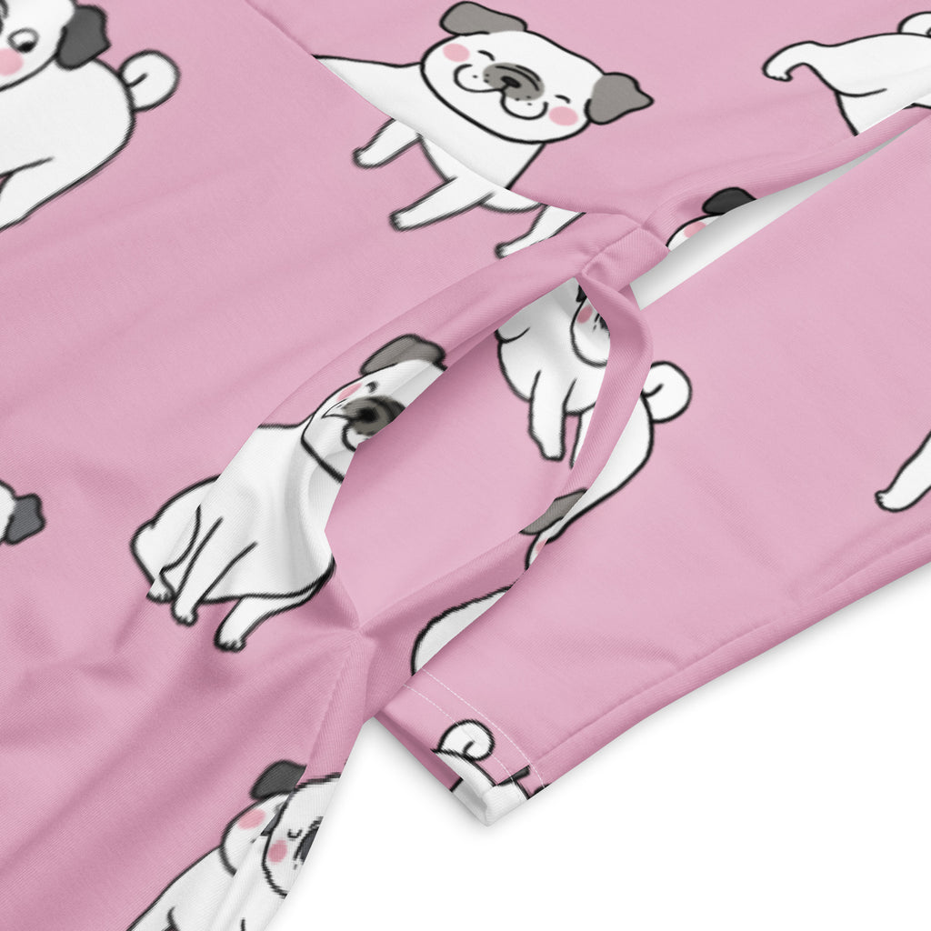 Women’s pink long sleeve midi dress with pockets featuring a repeating pattern of white and gray cartoon pugs