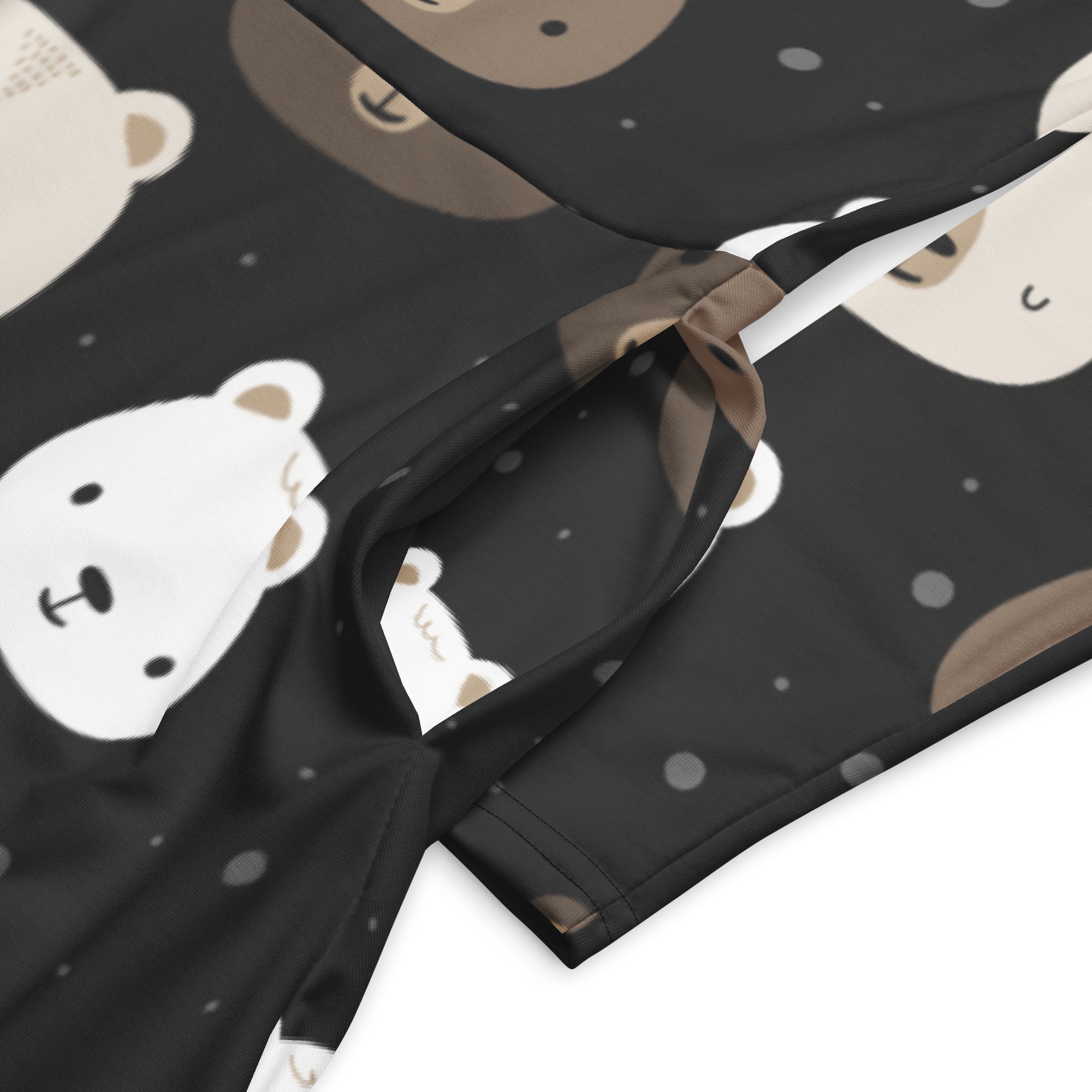 Women’s black long sleeve midi dress with pockets featuring playful white and beige cartoon bear face pattern and gray dots