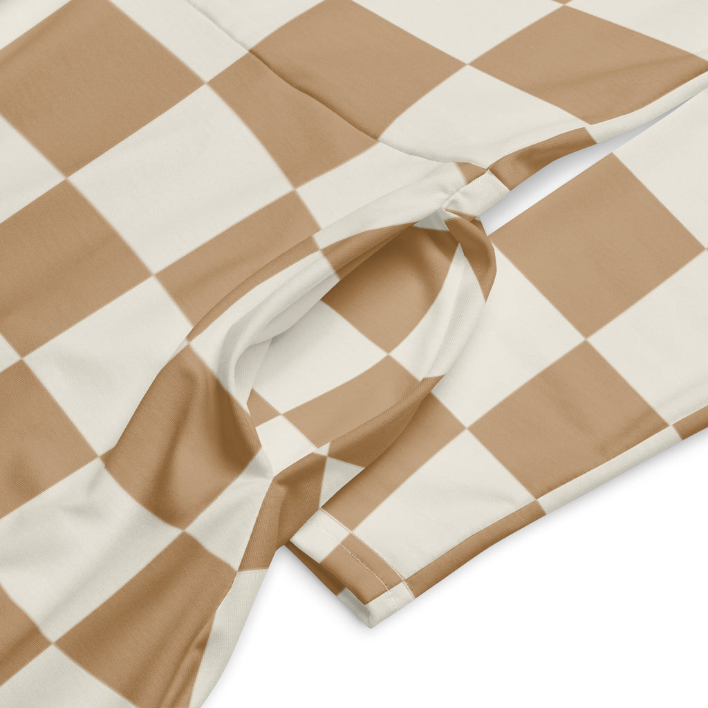 Women’s tan checkerboard long sleeve midi dress with pockets made of soft stretchy beige and cream checkered fabric