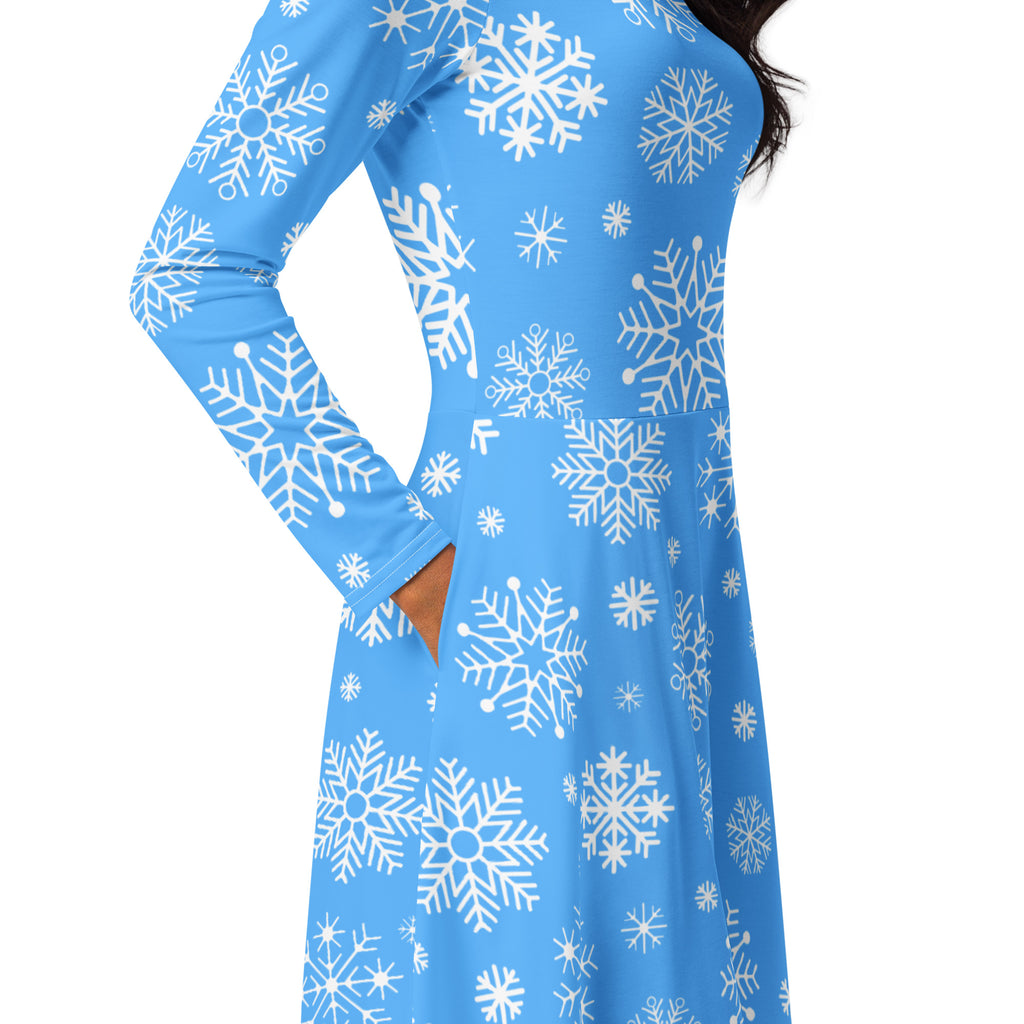 Women’s blue snowflake long sleeve midi dress with pockets featuring a patterned design on soft fabric