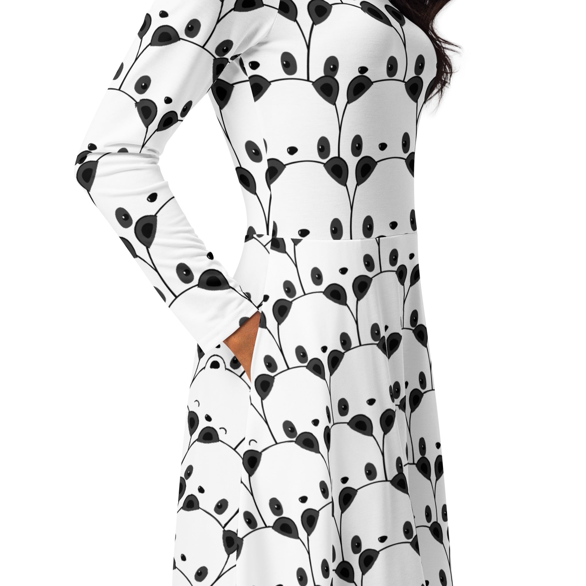 Women’s white long sleeve midi dress with playful black panda face pattern and pockets on soft fabric