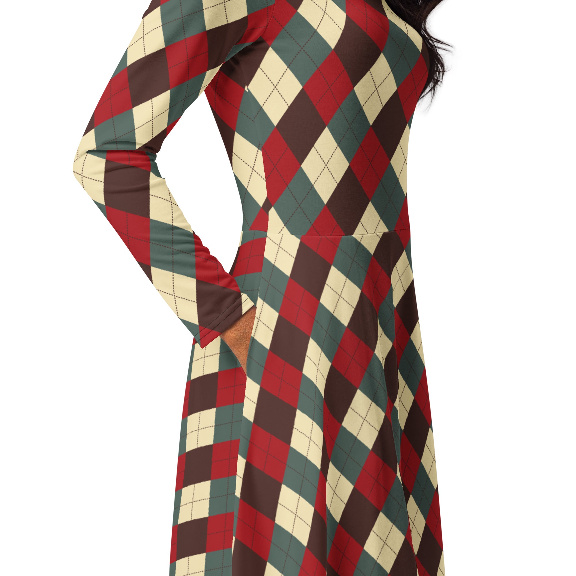 A woman wearing a women’s Christmas argyle long sleeve midi dress with pockets in red green and cream colors