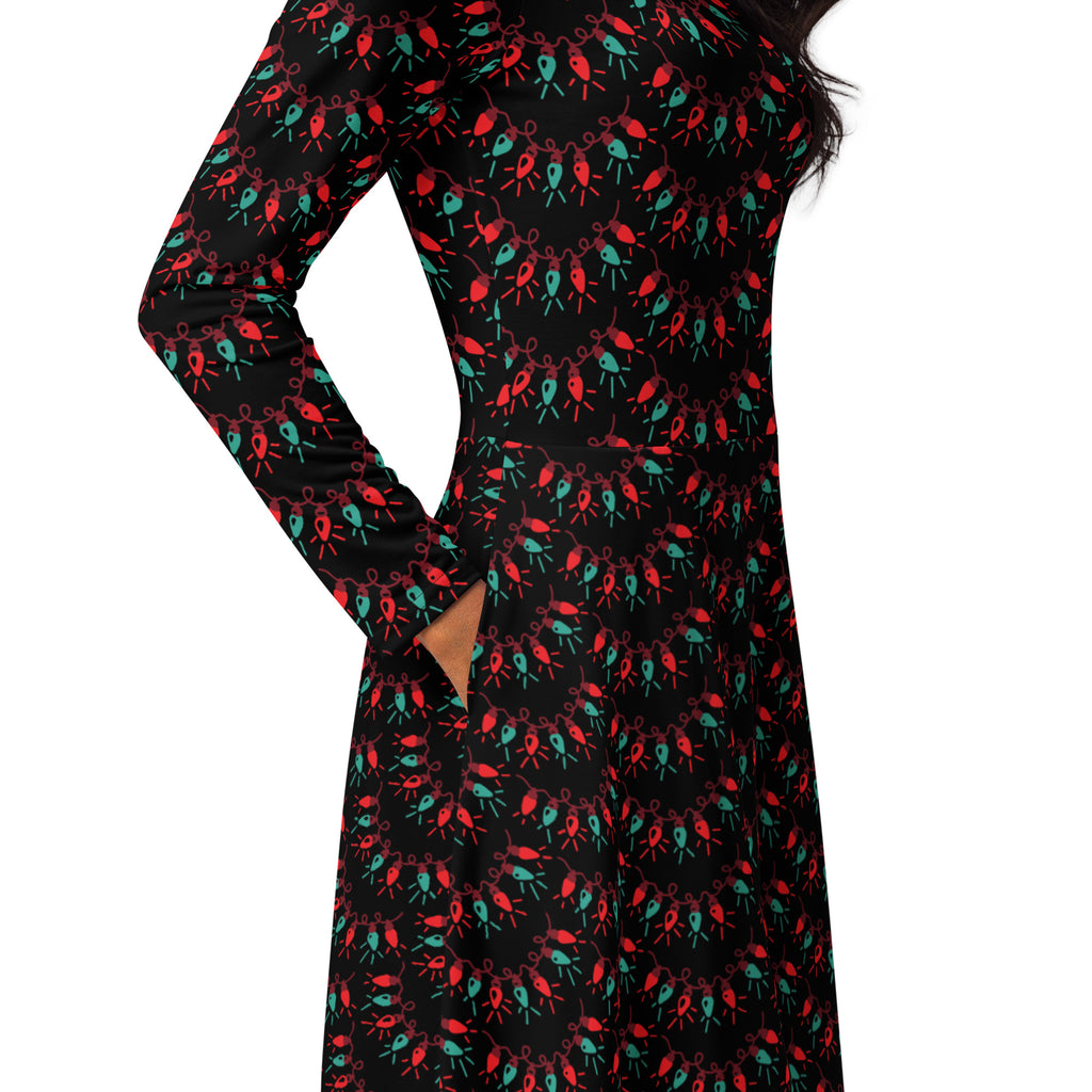Women’s black long sleeve midi dress with pockets featuring a festive red and teal christmas lights pattern