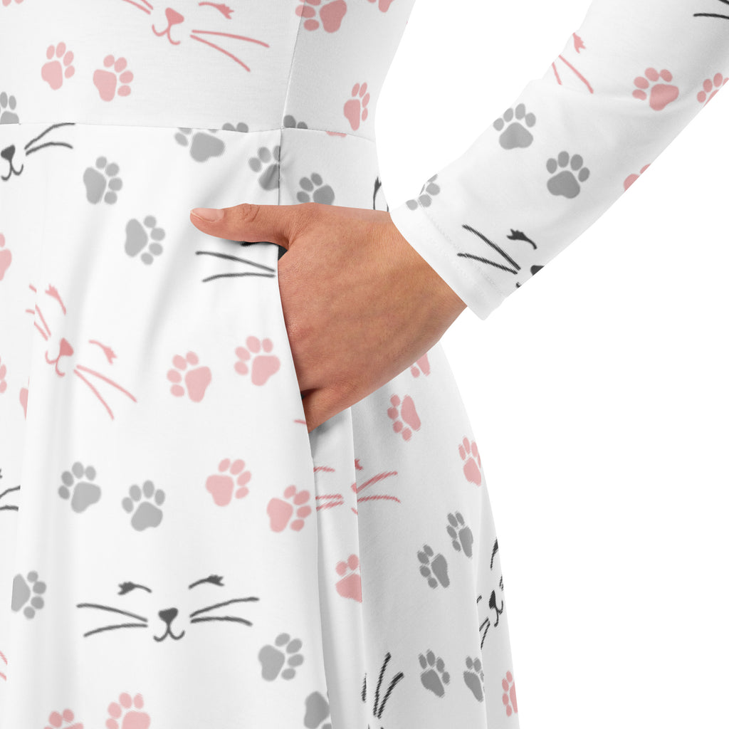 White long sleeve midi dress with pockets featuring pink and gray cat faces and paw prints made from soft fabric