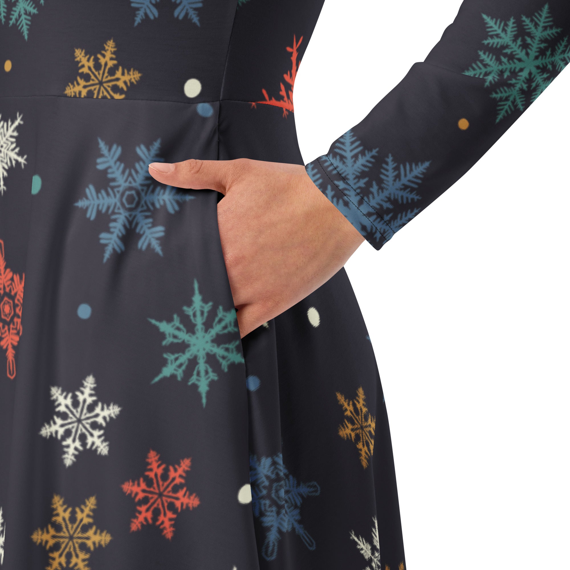 A dark navy women’s long sleeve midi dress with colorful snowflake pattern and pockets perfect for festive occasions